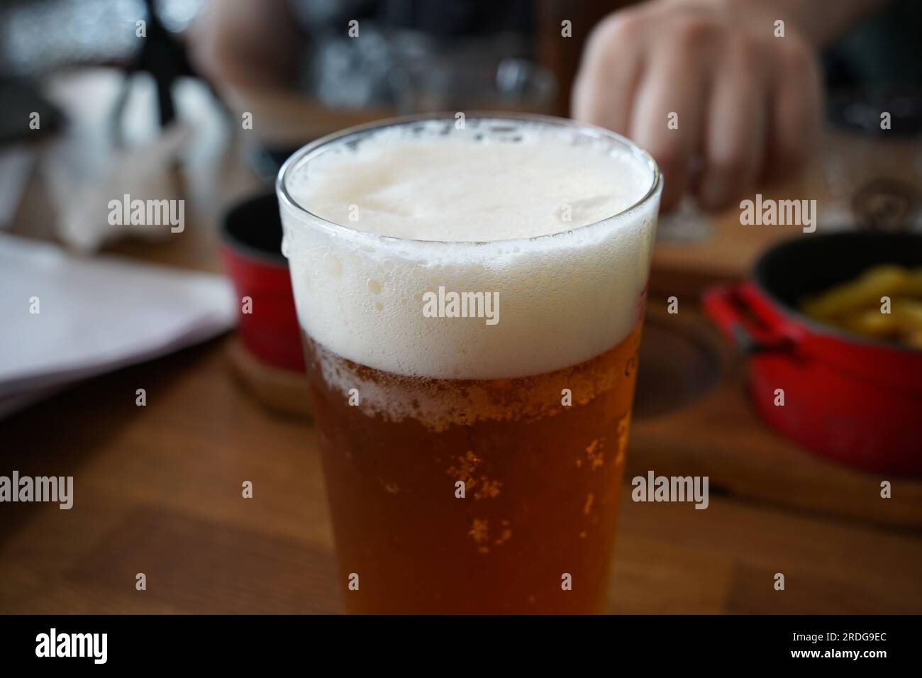 Czechstyle Pilsner lager golden beer on table of bar pub restaurant in