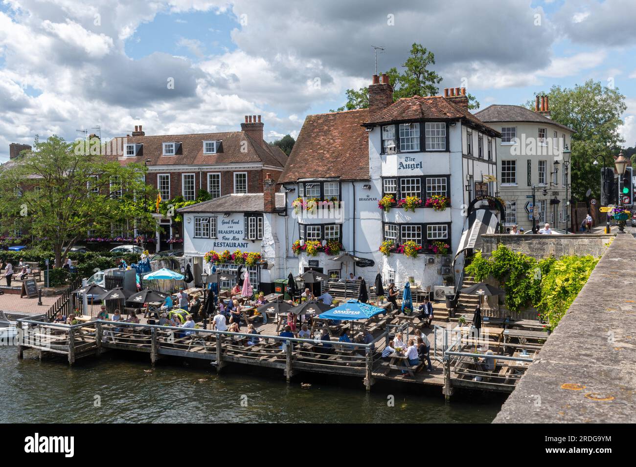 The Angel on the Bridge pub in Henley-on-Thames, Oxfordshire, England, UK, with people sitting outside on a summer day Stock Photo