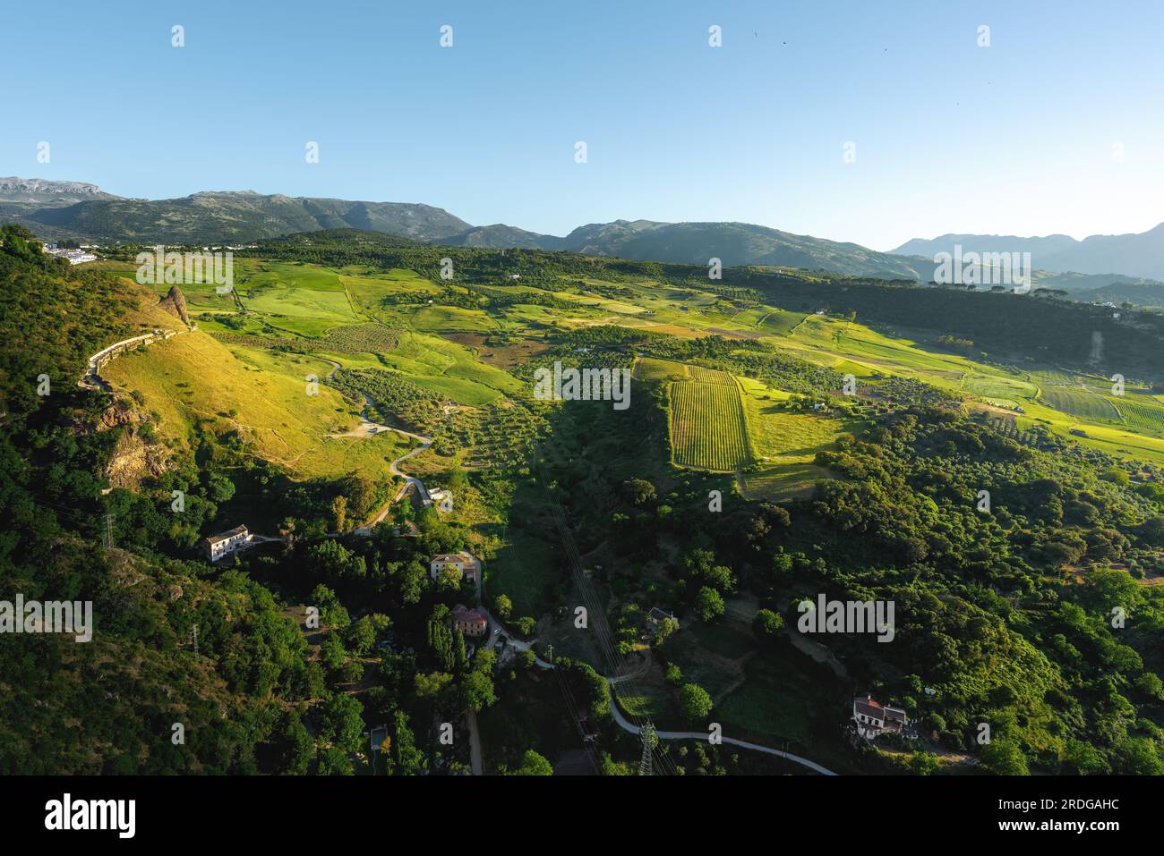 Aerial view of Ronda Valley with Sierra del Oreganal and Sierra Blanquilla Mountains - Ronda, Andalusia, Spain Stock Photo