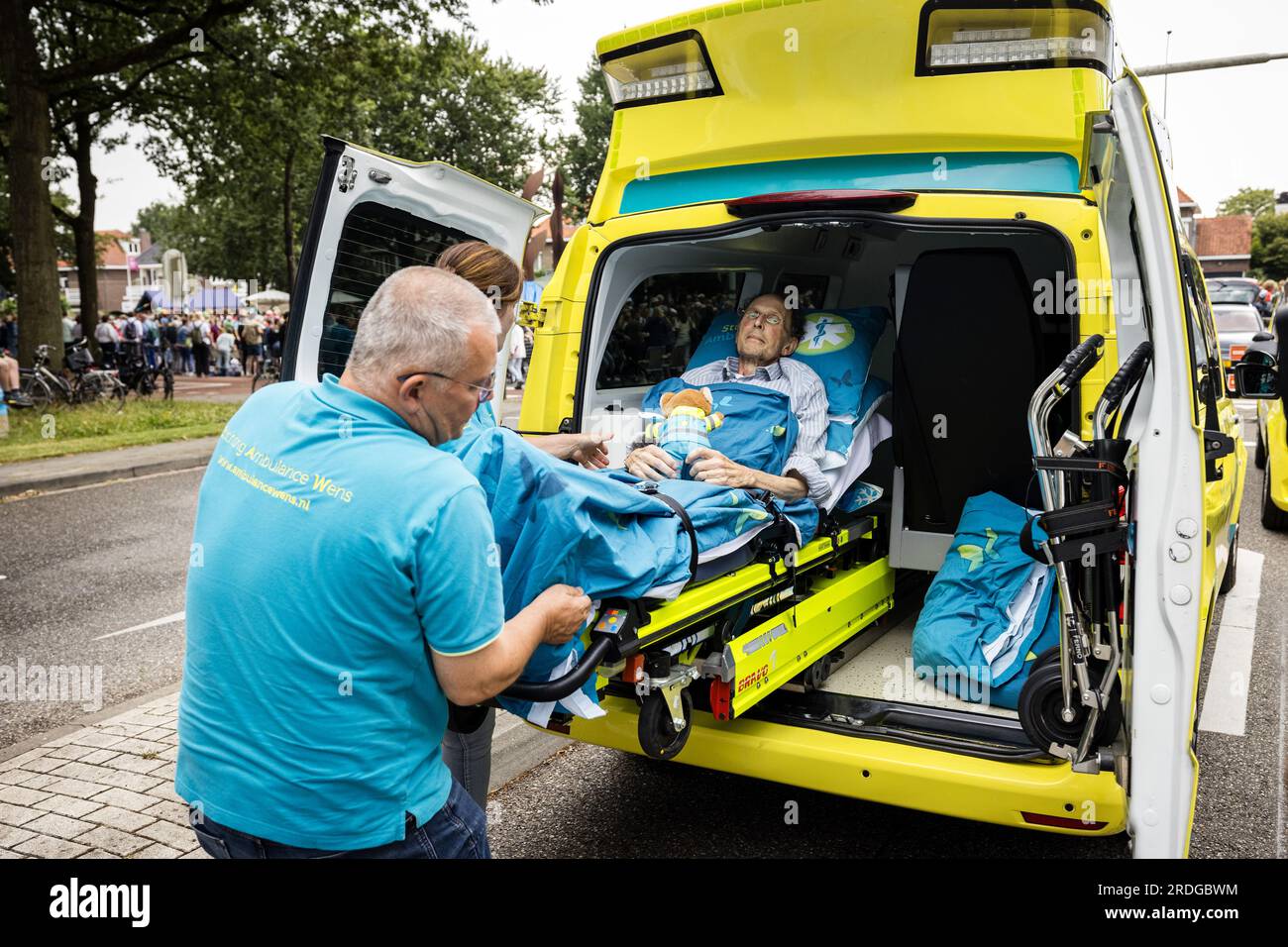 NIJMEGEN - 21072023, Mr. Art is waiting for its XXX together with  volunteers from the Ambulance Wens Foundation. Walkers walk on the Via  Gladiola during the last day of the Nijmegen Four