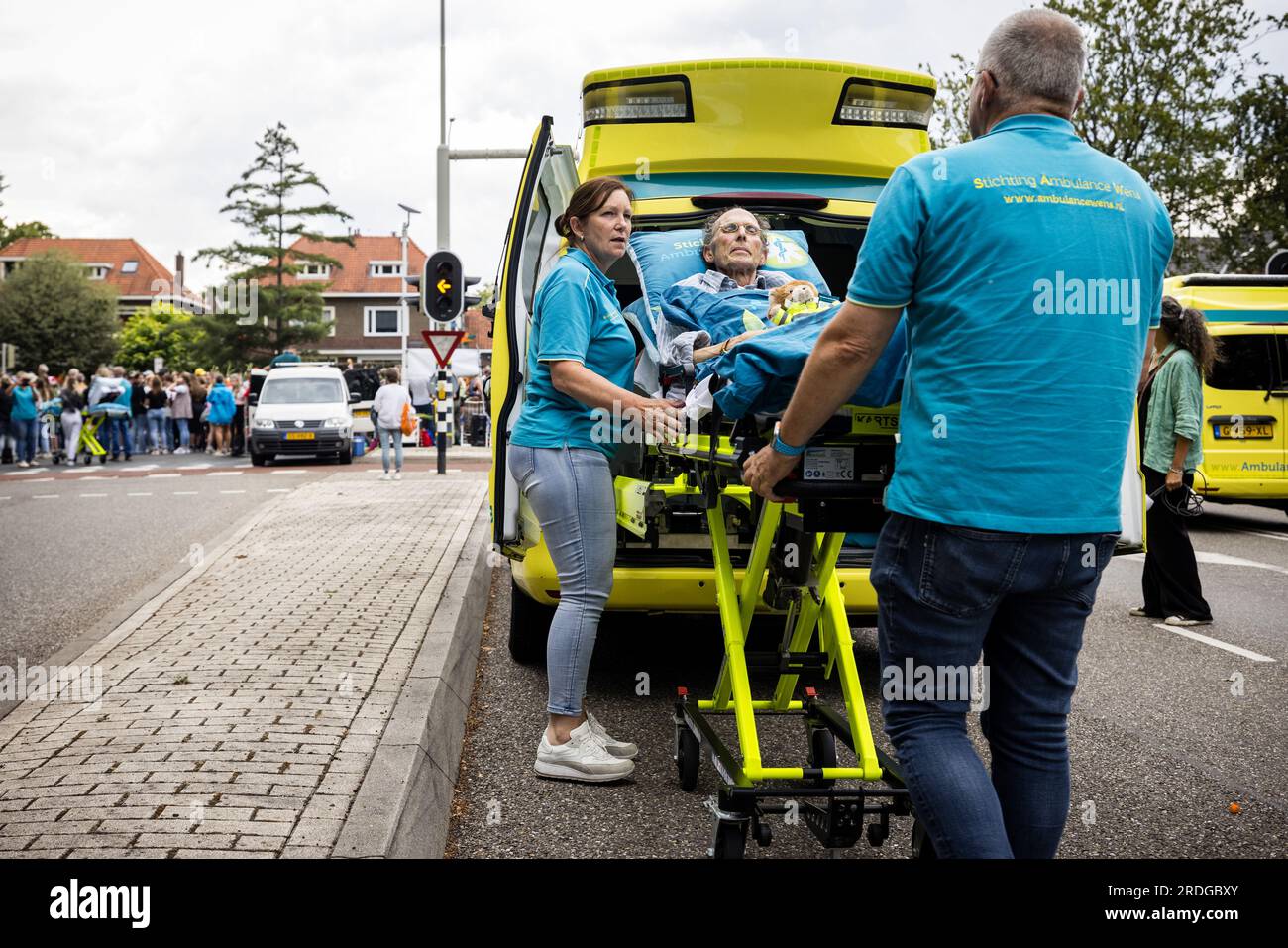 NIJMEGEN - 21072023, Mr. Art is waiting for its XXX together with  volunteers from the Ambulance Wens Foundation. Hikers walk on the Via  Gladiola during the last day of the Nijmegen Four