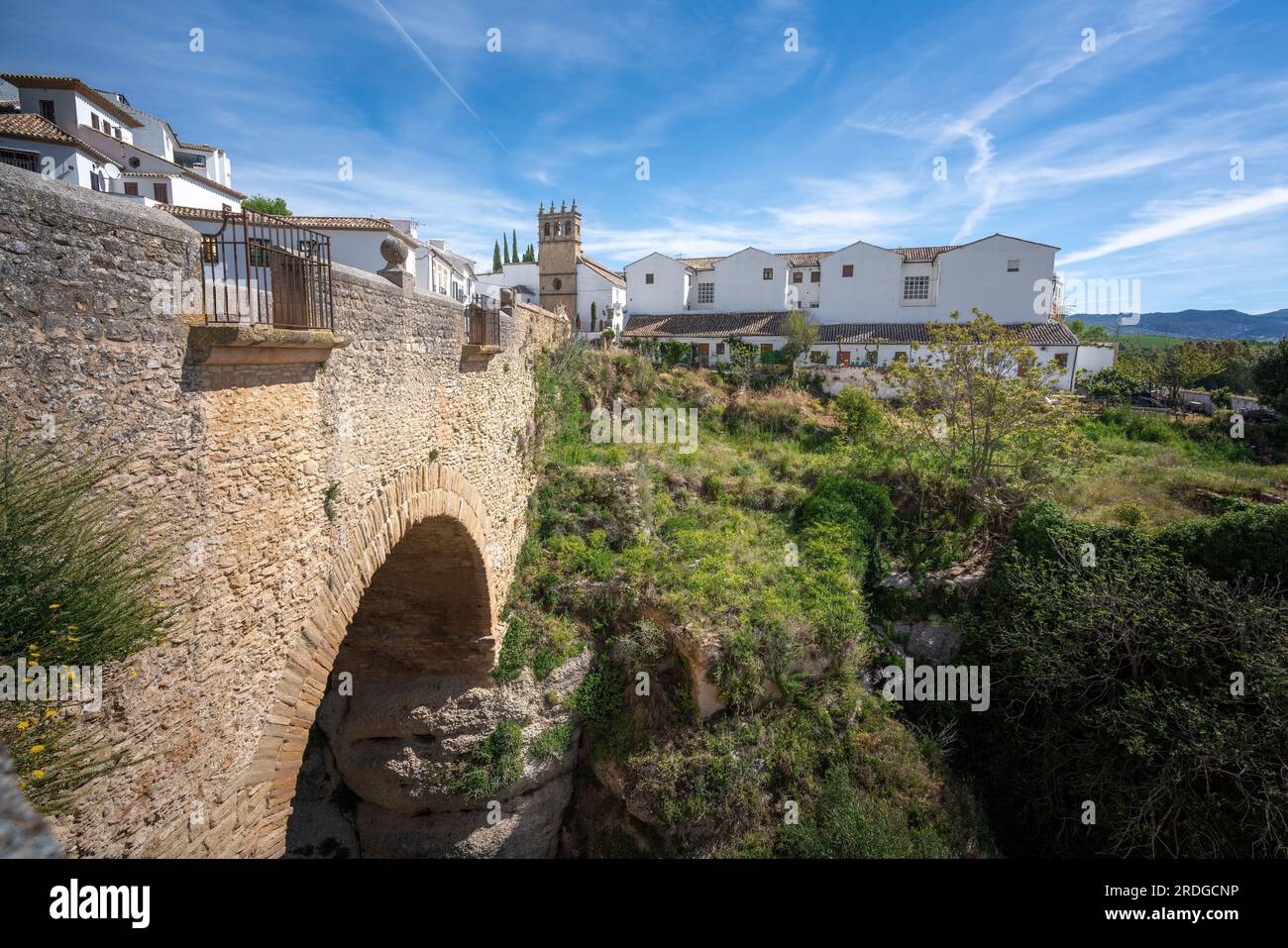 Puente Viejo Bridge and Nuestro Padre Jesus Church - Ronda, Andalusia, Spain Stock Photo