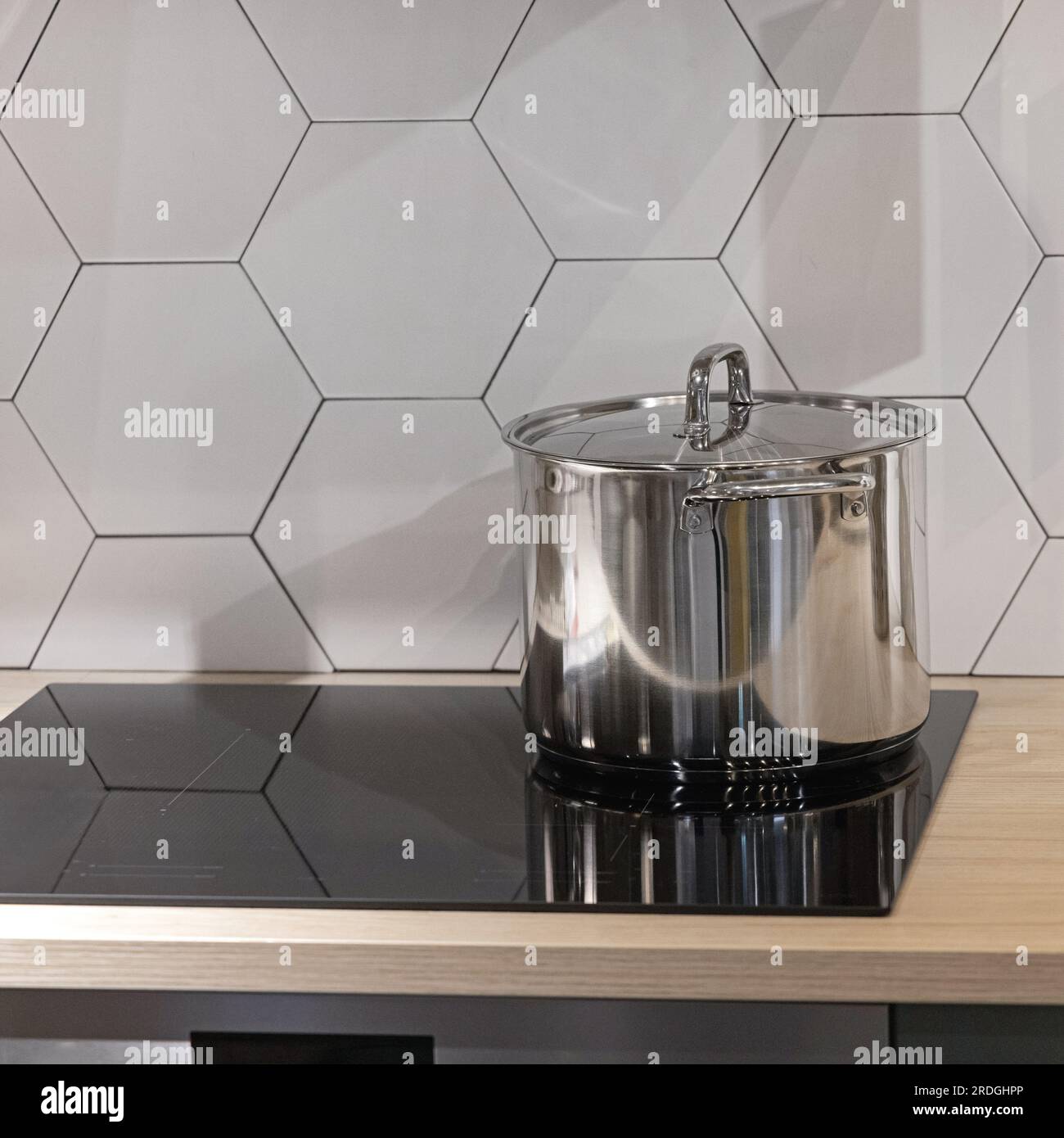 Stainless Steel Cooking Pot at Induction Ceramic Stove Top Kitchen