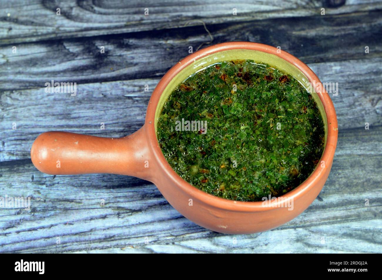 Mulukhiyah, also known as molokhia, molohiya or ewedu, a dish made from the leaves of Corchorus olitorius, commonly known in English as denje'c'jute, Stock Photo