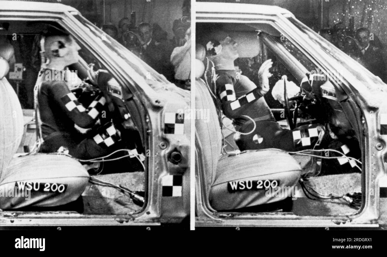 Detroit, Michigan:  May 23, 1972 A crash test dummy demonstrates what happens when an air bag fails to deploy. At left it slams into the windshield and steering column in a 30 mph crash, and then bounces back into the seat while pieces of windshield fly through the air. The unopened air bag hangs from the steering wheel. Stock Photo