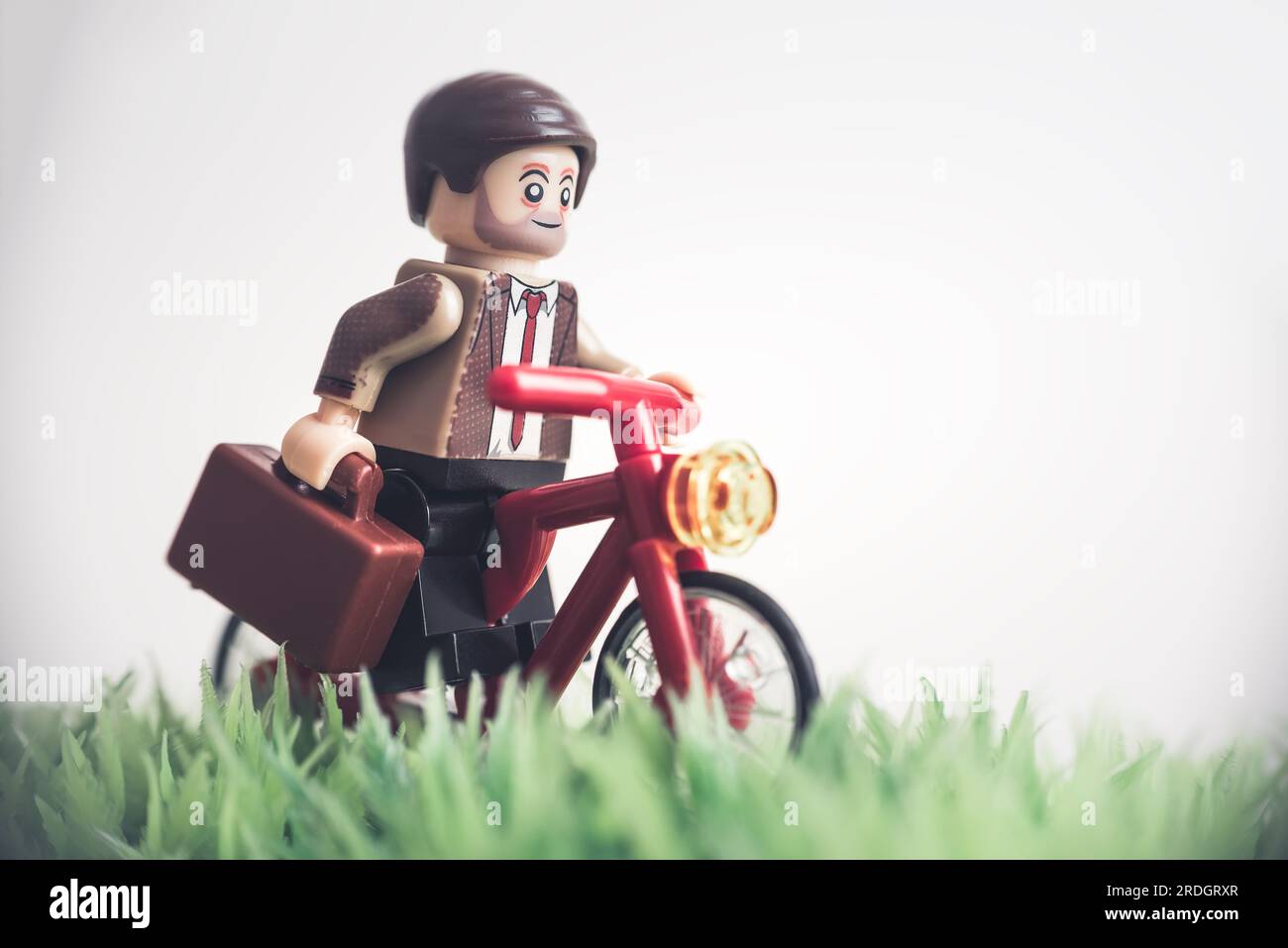 To work by bike. Business concept. Illustrative editorial. July 30, 2023 Stock Photo