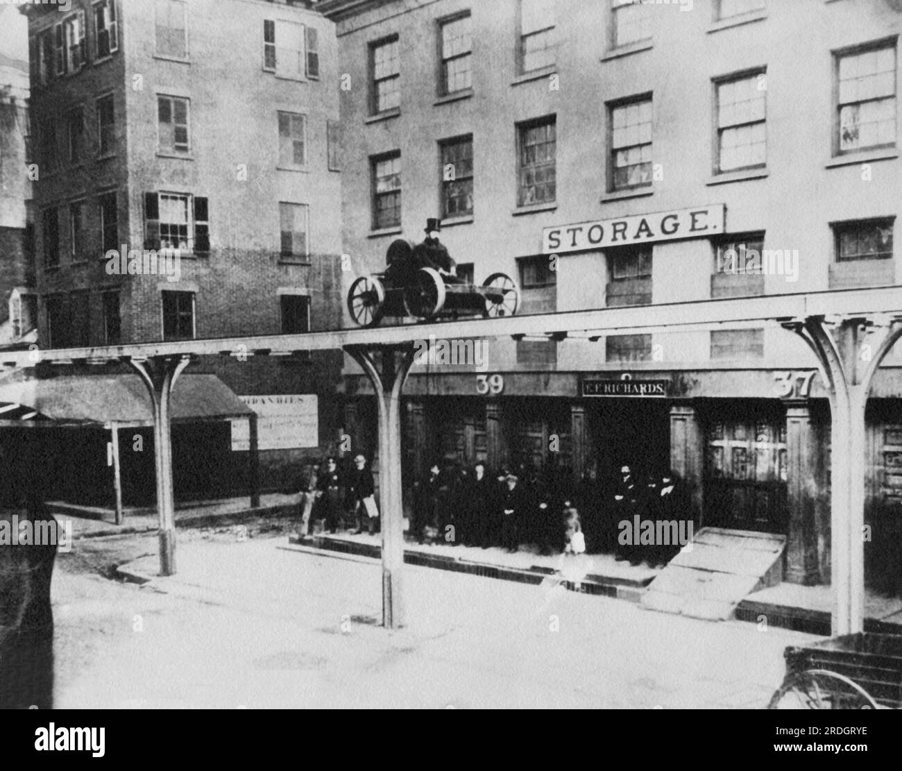 New York, New York:  December, 1867 Charles T. Harvey is making a southbound test run along the Greenwich Street portion of his cable-driven West Side and Yonkers Patented Railway. Stock Photo
