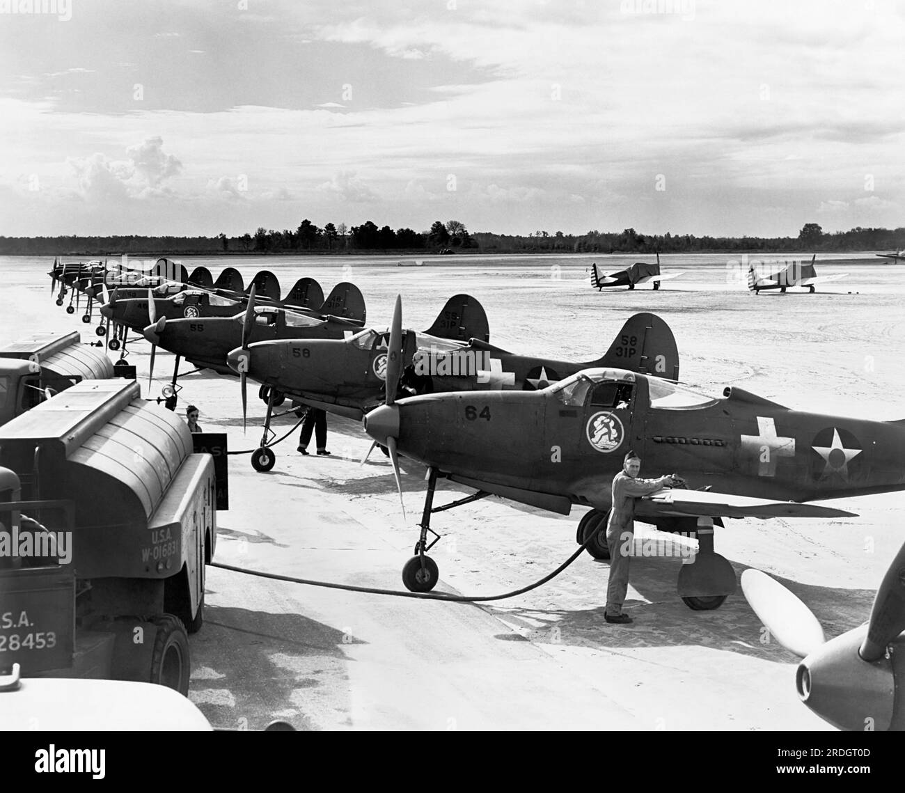 United States:  c. 1939 Men servicing Army Air Corp Bell P-39 Airacobra fighter planes Stock Photo