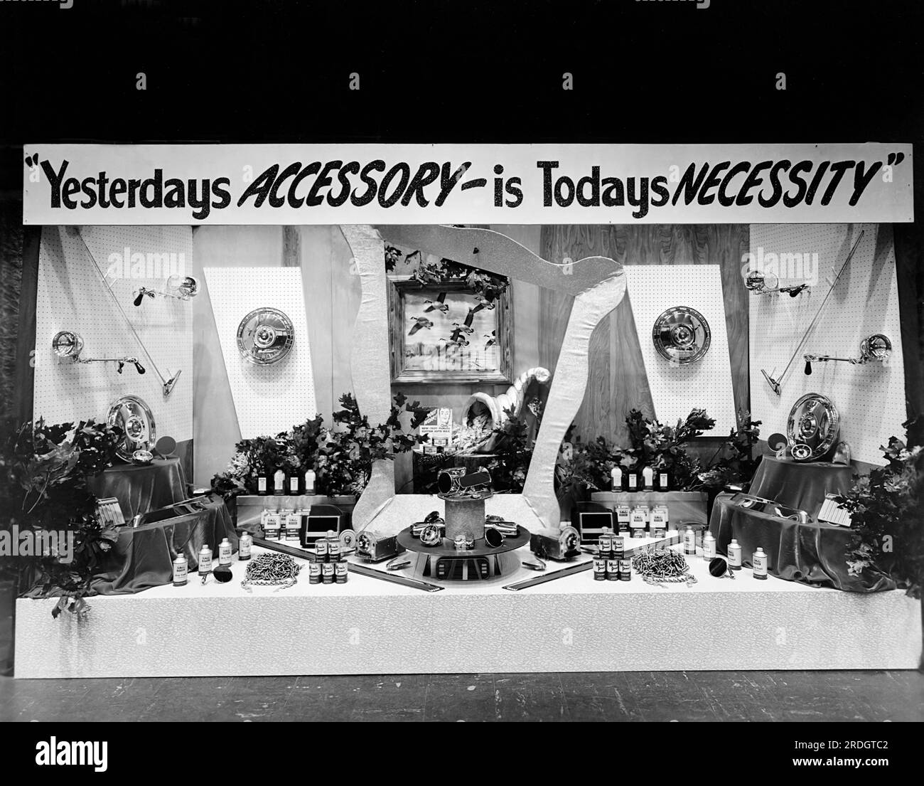 Salt Lake City, Utah:  November, 1954 An automotive accessories display at the 1955 Car and Truck Show for dealers and salemen at the Coliseum. Stock Photo