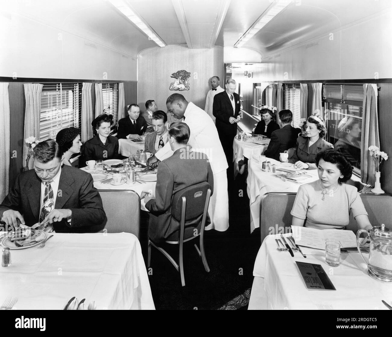 United States:  c. 1952 Passengers in the dining car on a Rio Grande streamliner train. Stock Photo