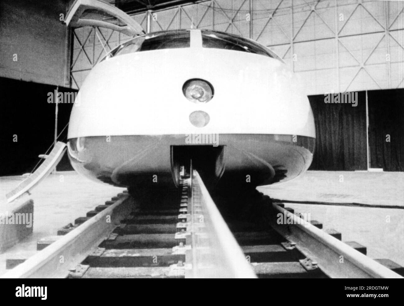Los Angeles, California:  December 9, 1969 An ultra-streamlined test train built by the Garrett Corporation for the U.S. Dept. of Transportation. It is powered by a linear induction motor which is seen between the two coventional tracks and is designed to operate at speeds up to 250 mph. Stock Photo
