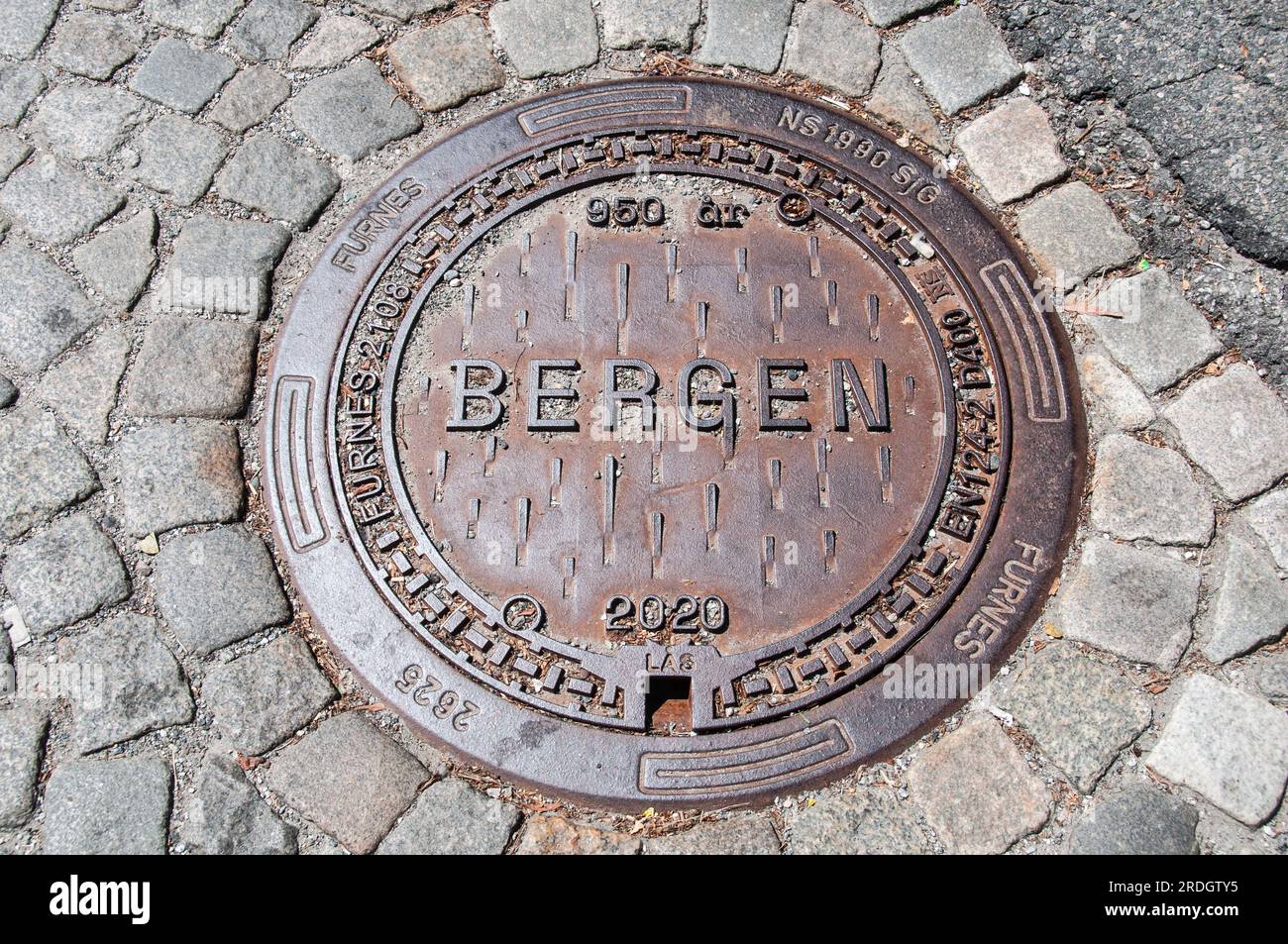 Around Bergen Elaborate manhole / inspection chamber cover Stock