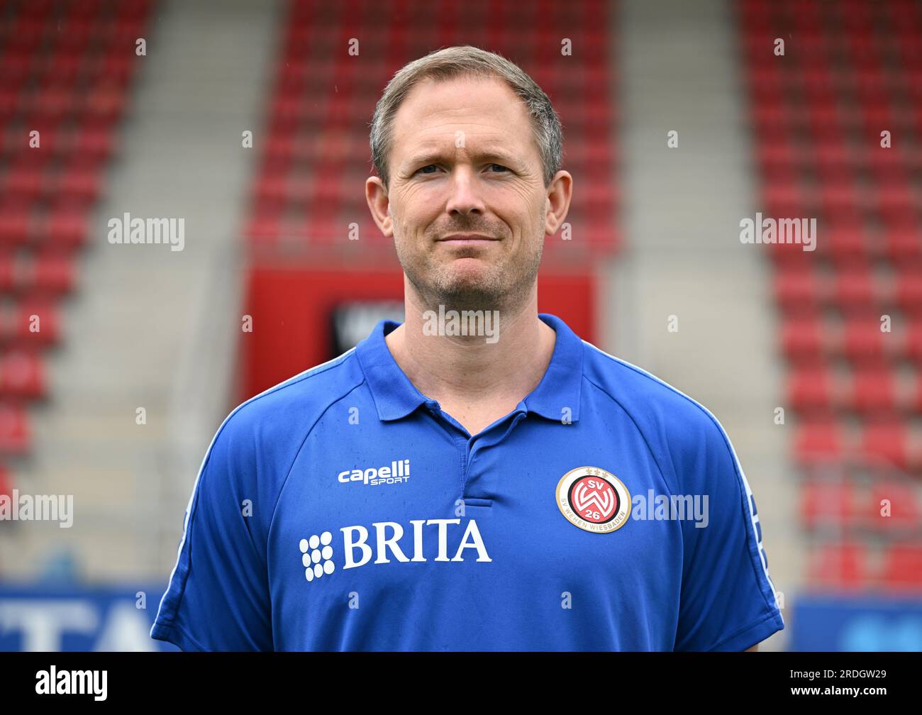 Wiesbaden, Germany. 21st July, 2023. Soccer, 2. Bundesliga, 2023/24 season, SV Wehen Wiesbaden photo session at the Brita Arena. Sebastian Wagener (athletics coach). Credit: Arne Dedert/dpa - IMPORTANT NOTE: In accordance with the requirements of the DFL Deutsche Fußball Liga and the DFB Deutscher Fußball-Bund, it is prohibited to use or have used photographs taken in the stadium and/or of the match in the form of sequence pictures and/or video-like photo series./dpa/Alamy Live News Stock Photo