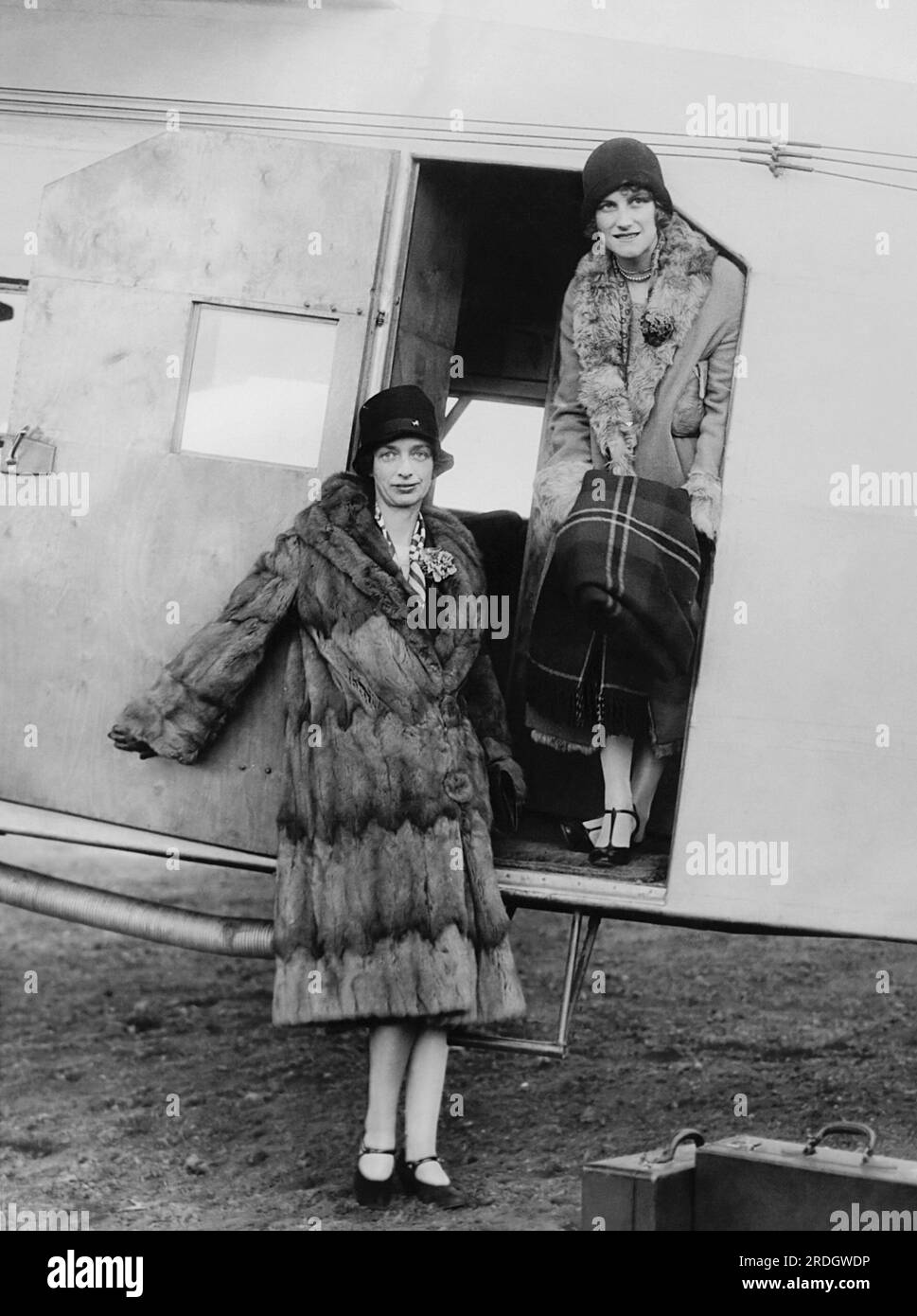 New York, New York:  April 5, 1927 The official opening of the airline  passenger service between Boston and New York took place when the first two women to make the night trip alighted from the air mail plane in New York. The fare was $25 per person. Stock Photo
