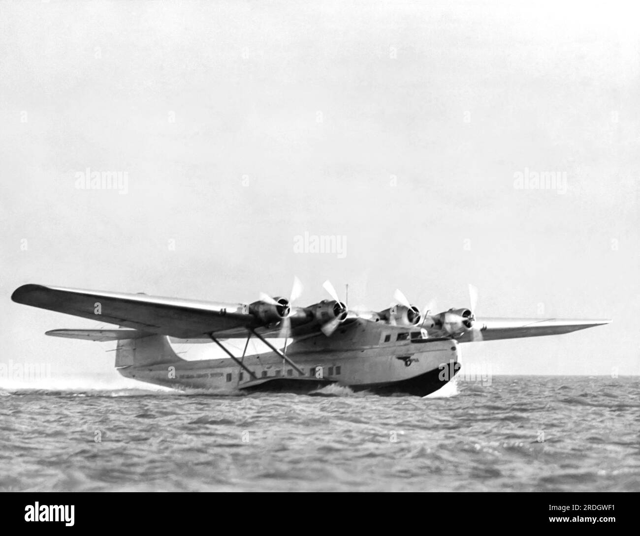Alameda, California:  November 11, 1935 The China Clipper seaplane which will make the inaugural flight of Pan American Airways' transpacific service to Manila as it arrives in San Francisco Bay . Stock Photo