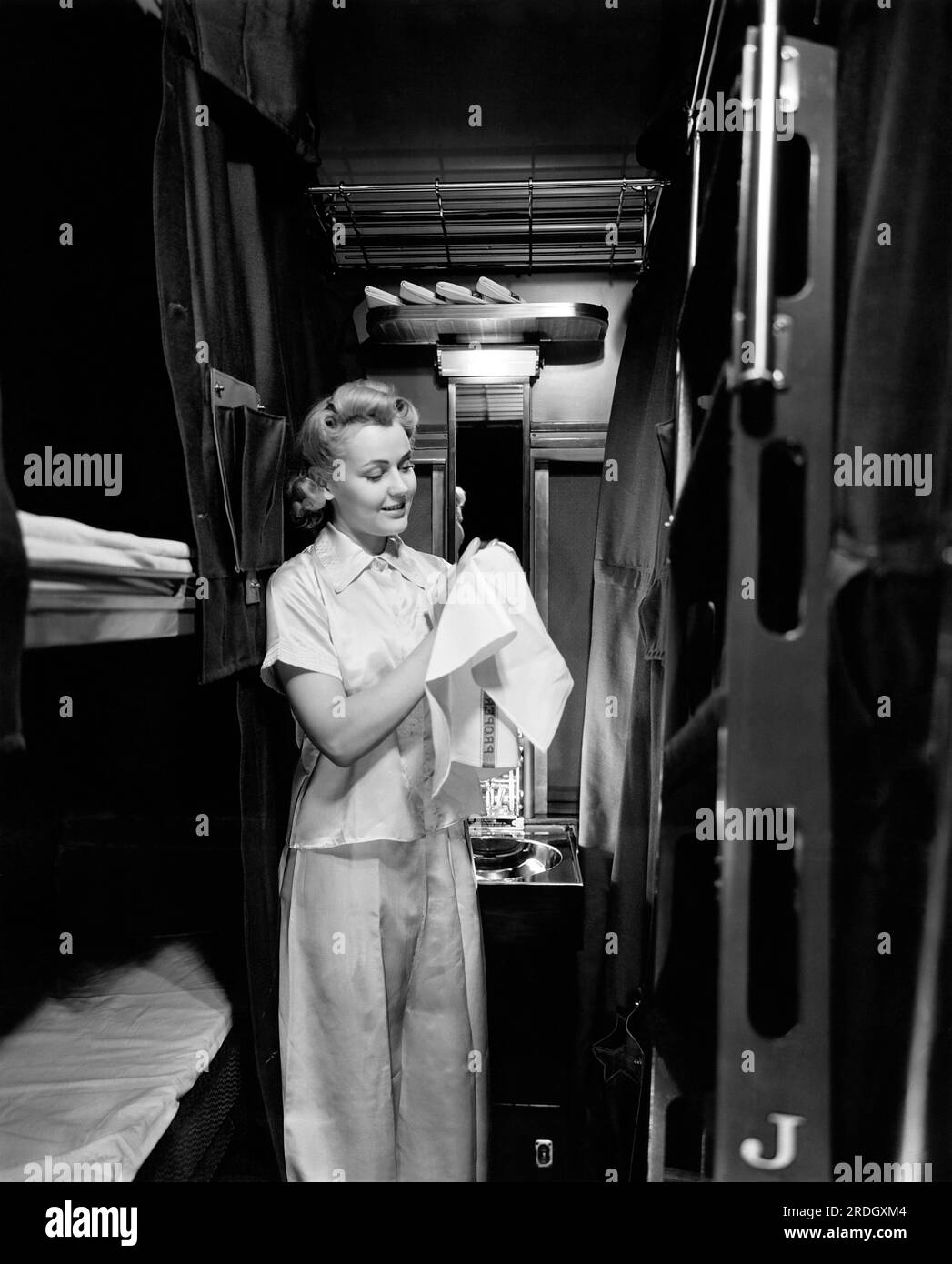 Chicago, Illinois:  November, 1940 'Coach-sleepers' are the latest development of the Pullman Company. Each compartment is equipped with a wash basin with hot and cold running water, a dental faucet and a mirror. Stock Photo