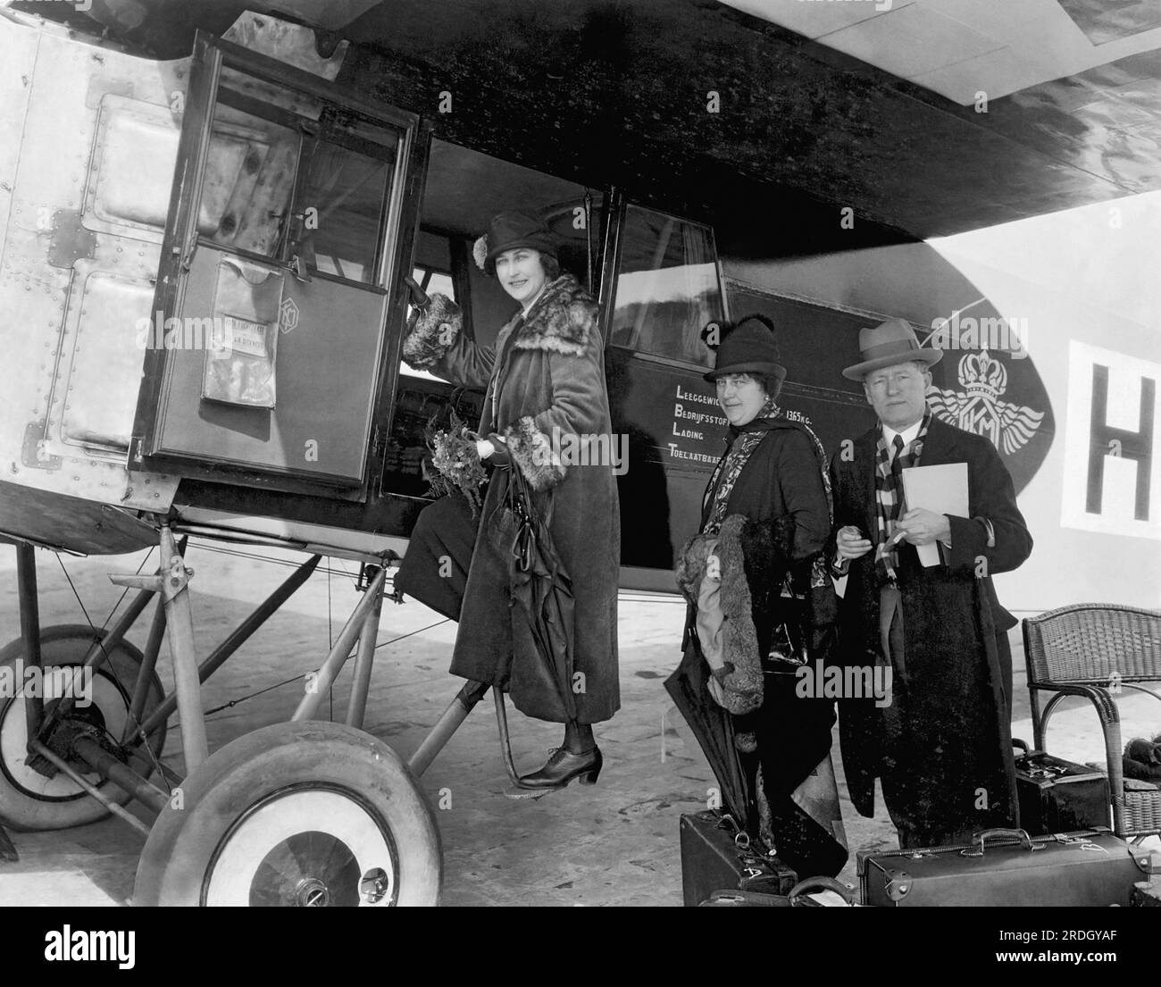 Paris, France:  c. 1924 Passengers boarding a Fokker passenger plane enroute to Amsterdam. Stock Photo