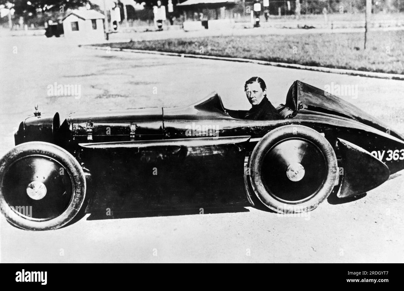Paris, France:  c. 1931 Gwenda Stewart in her bantam car in which she set the world's small-car speed record of 109.13 mph at the Montlhery Track near here. Stock Photo