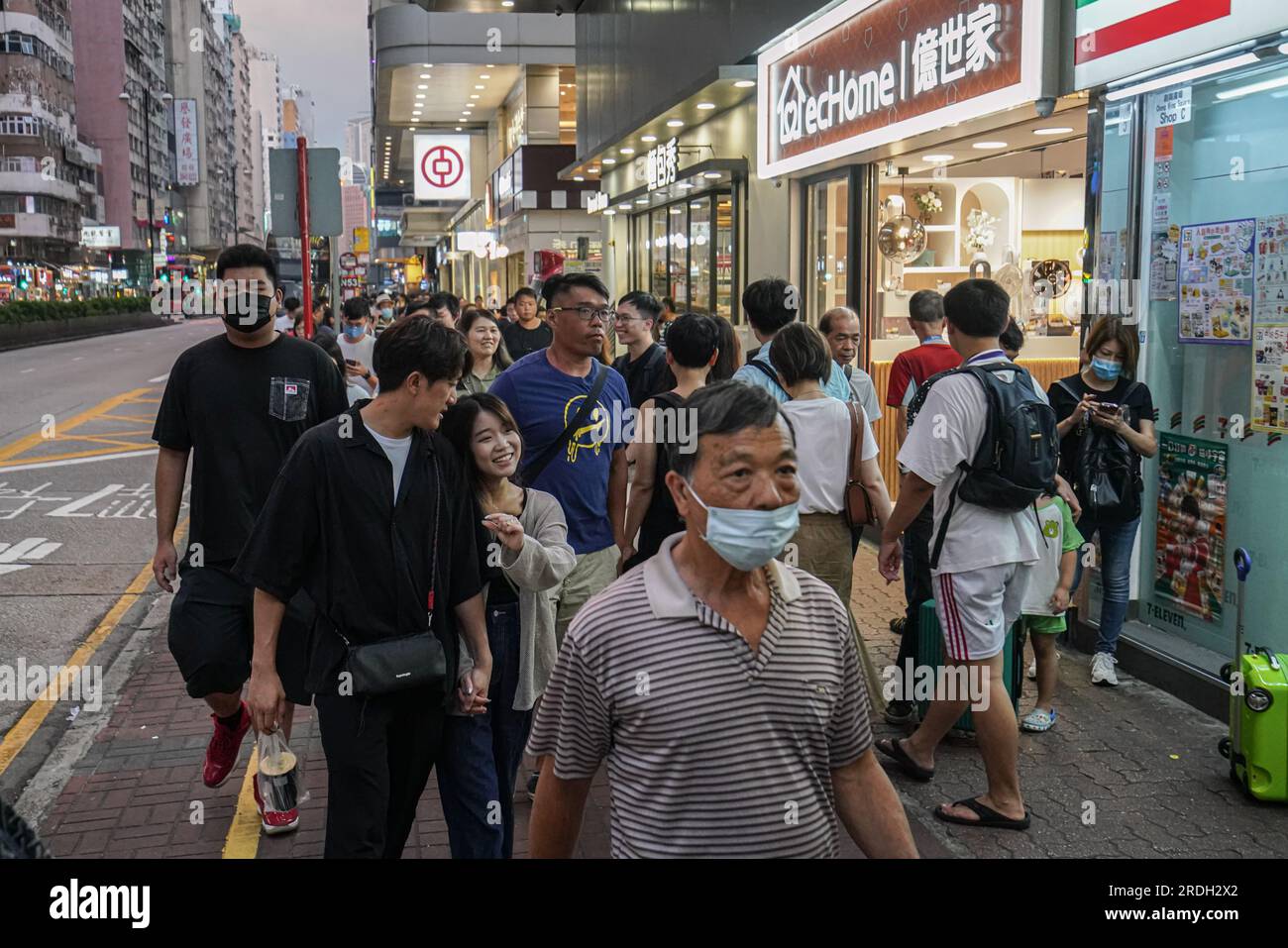 Hong Kong, China. 07th July, 2023. People walk on the streets in Mong Kok. (Photo by Michael Ho Wai Lee/SOPA Images/Sipa USA) Credit: Sipa USA/Alamy Live News Stock Photo