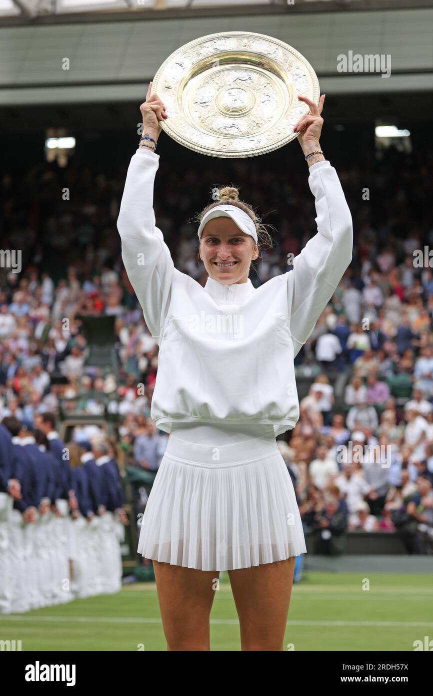 Marketa Vondrousova with the winners trophy. Ons Jabeur versus Marketa