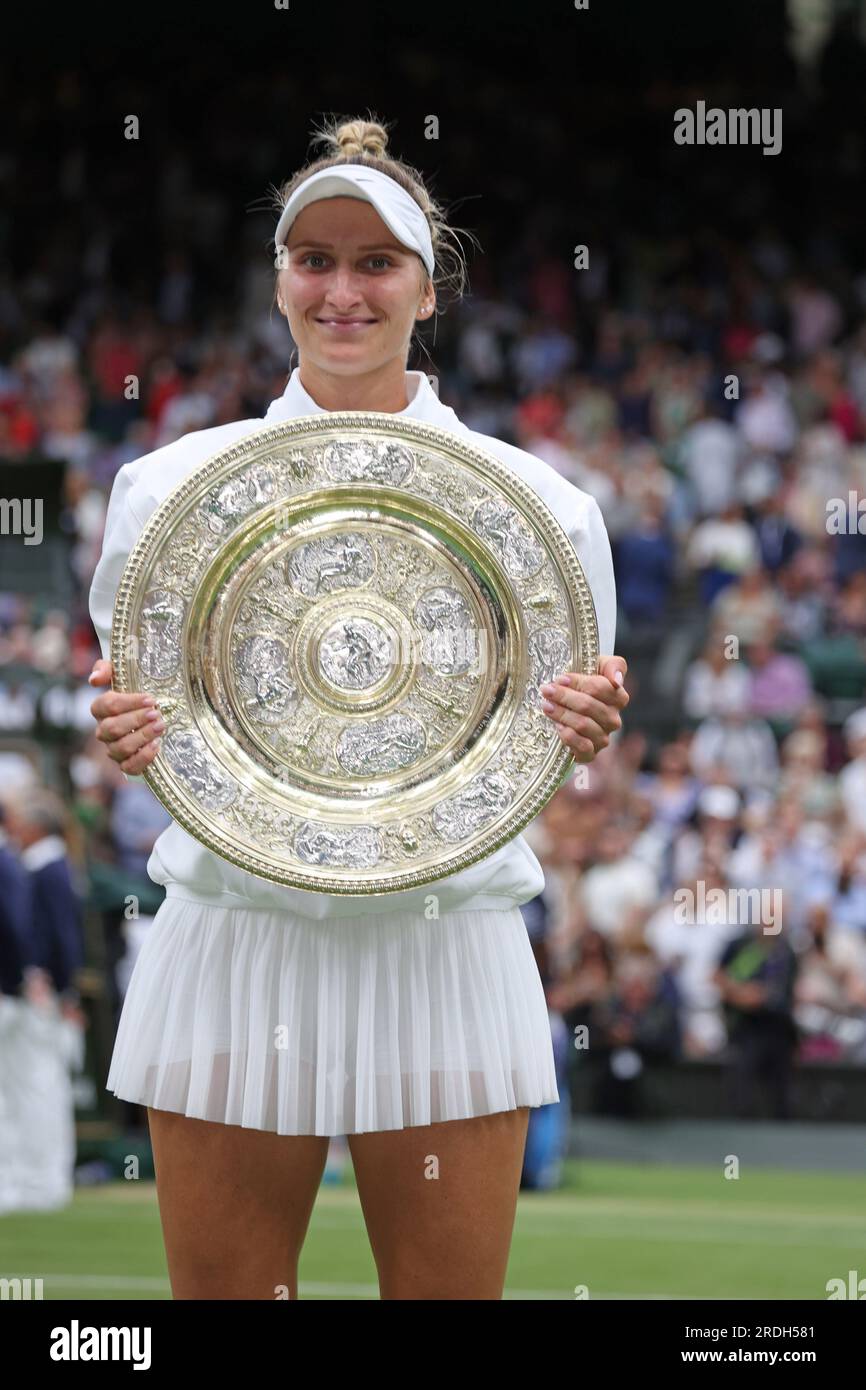 Marketa Vondrousova with the winners trophy. Ons Jabeur versus Marketa