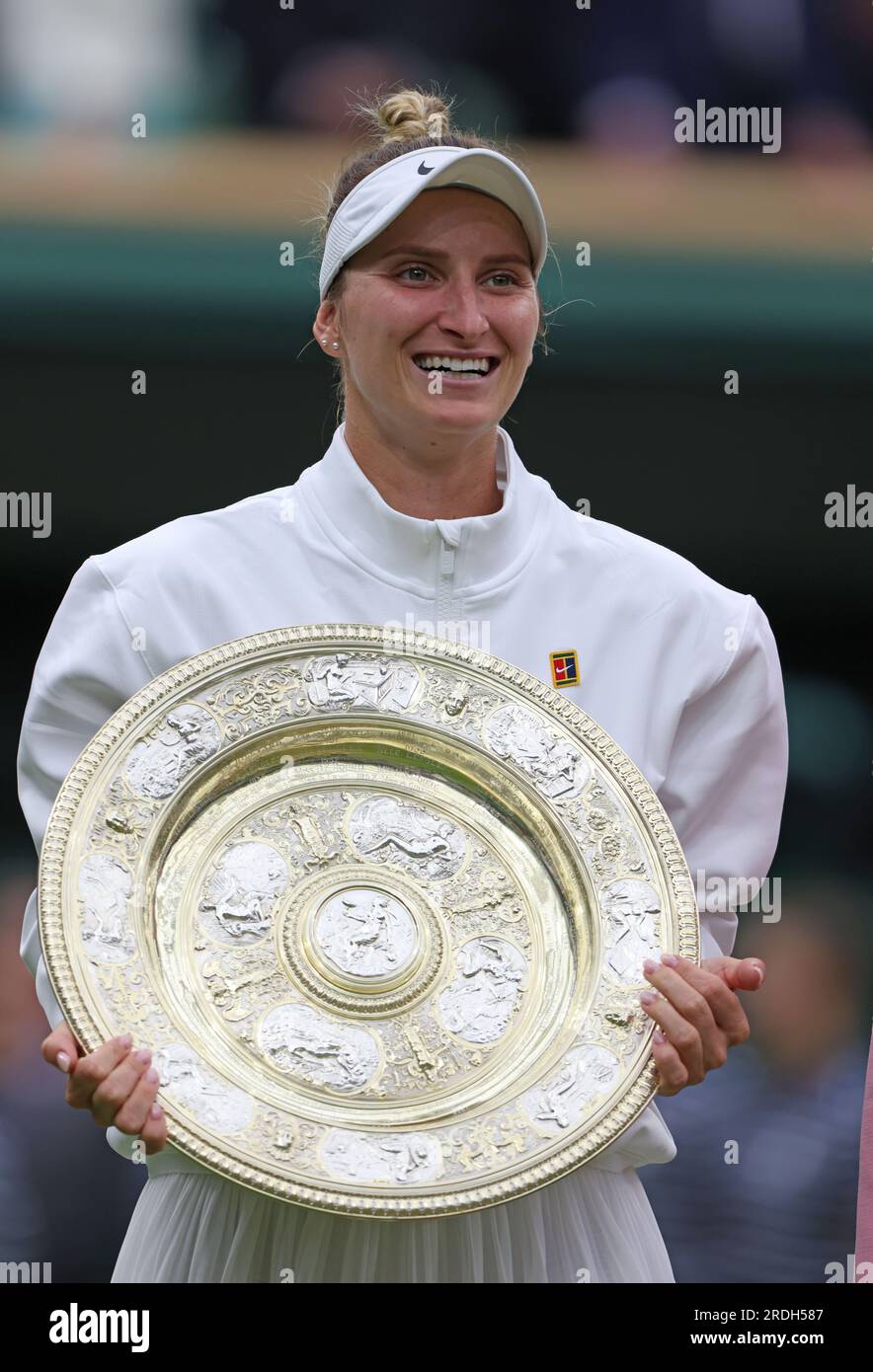 Marketa Vondrousova with the winners trophy. Ons Jabeur versus Marketa