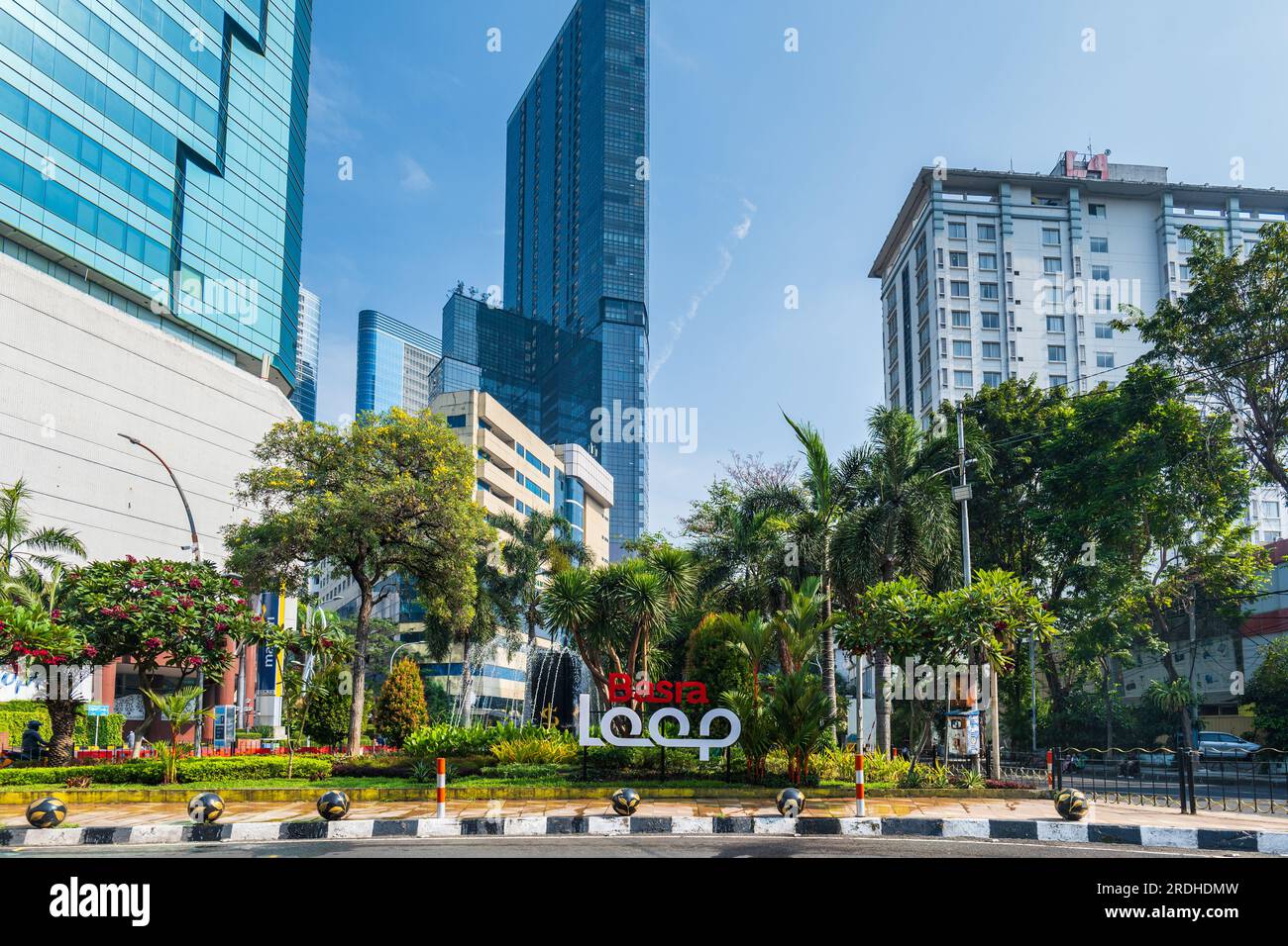 Surabaya, Indonesia - 07.19.2023: Surabaya downtown area cityscape with traffic in Surabaya, East Java, Indonesia. Surabaya is the second biggest city in Indonesia Stock Photo