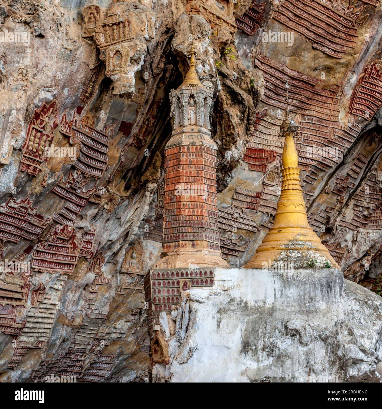 Old buddhist pagoda with carvings in Kaw Goon cave, Myanmar. Stock Photo