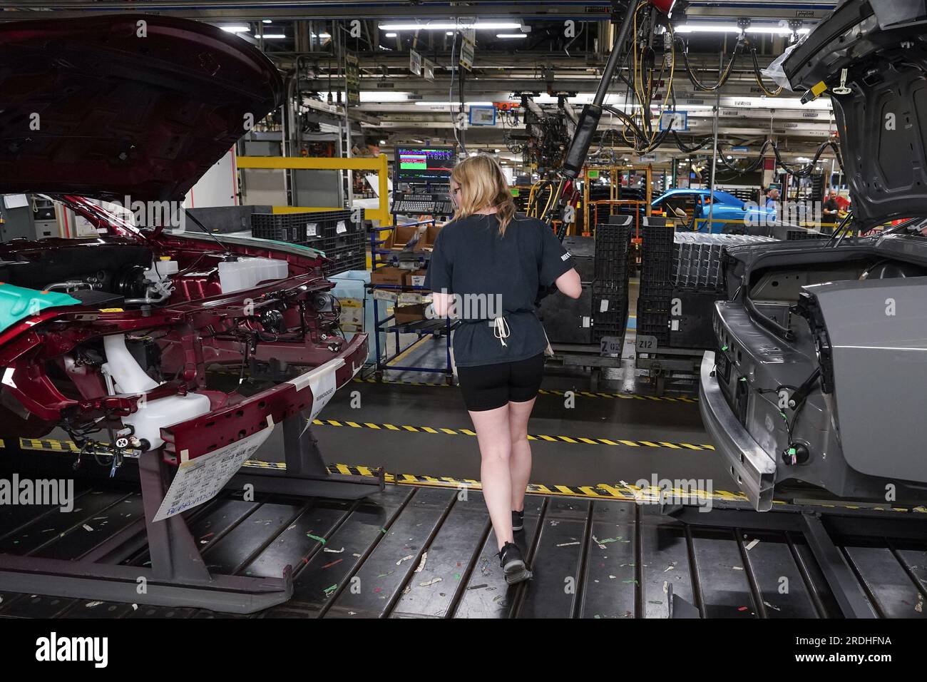 Brampton, Can. 21st July, 2023. Cars pass along the assembly line at