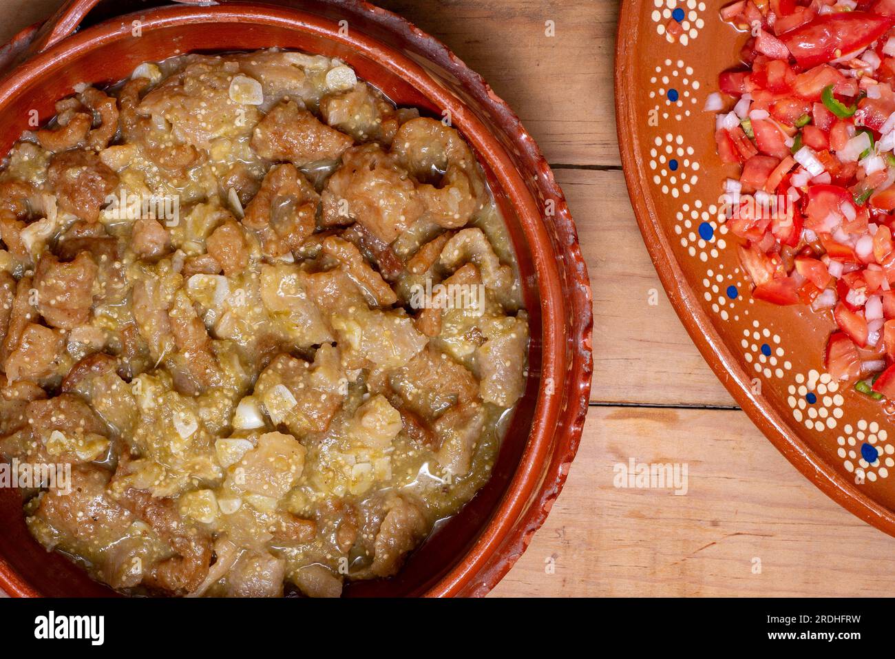 Chicharrones in green sauce, typical Mexican food. Meal served in a