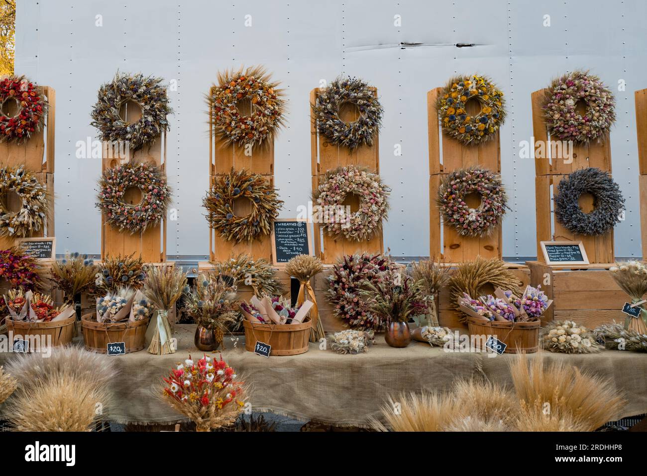 November 23, 2022 - New York, USA: Handmade wreaths and dry flowers on sale at Grow NYC Union Square Greenmarket, a year-round farmers market with var Stock Photo