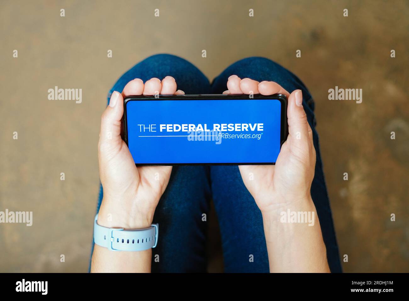 In this photo illustration, the Federal Reserve Bank Services (FRB Services) logo seen displayed on a smartphone. Stock Photo