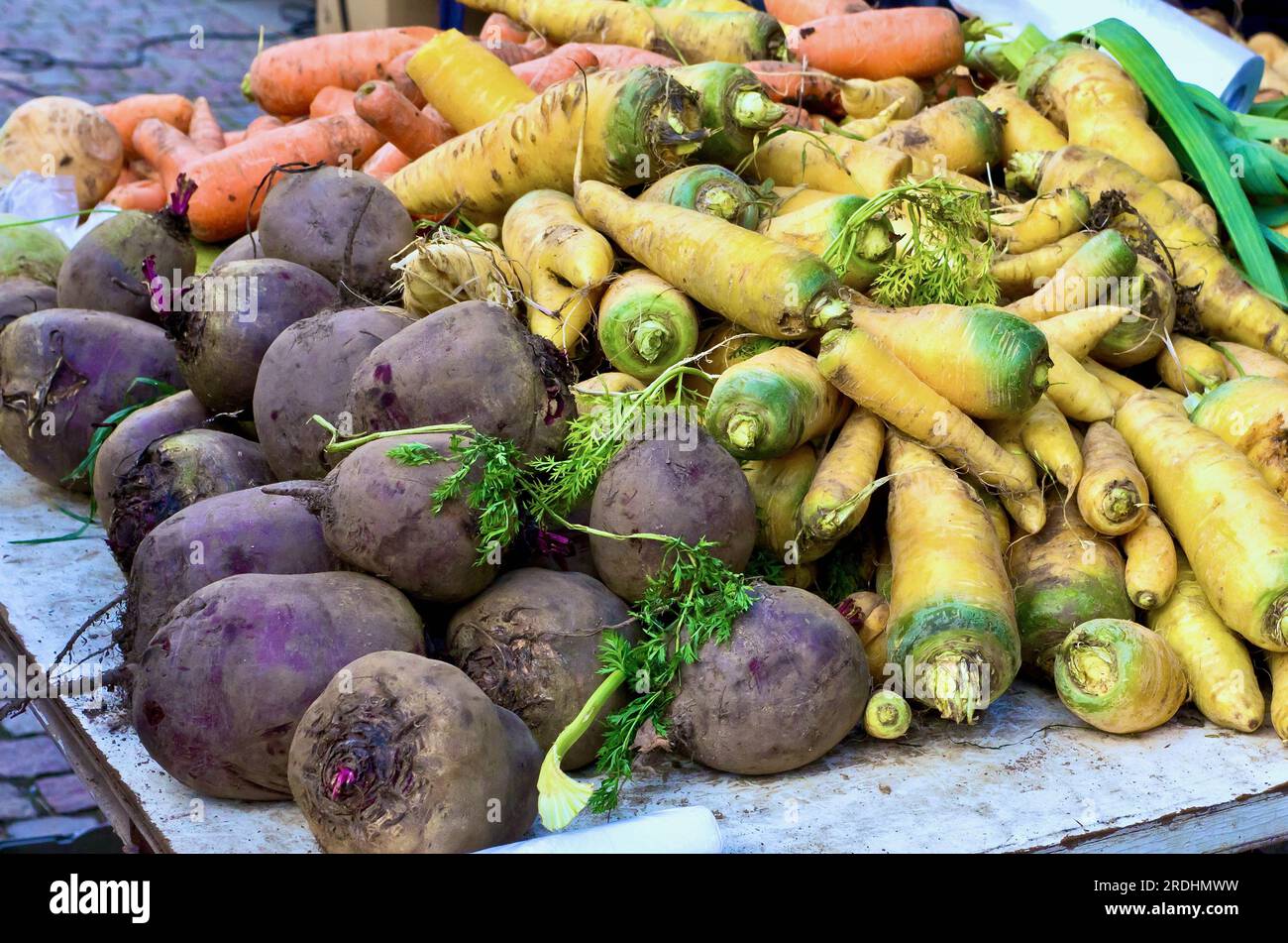 Root vegetables for sale at farmers market. Stock Photo