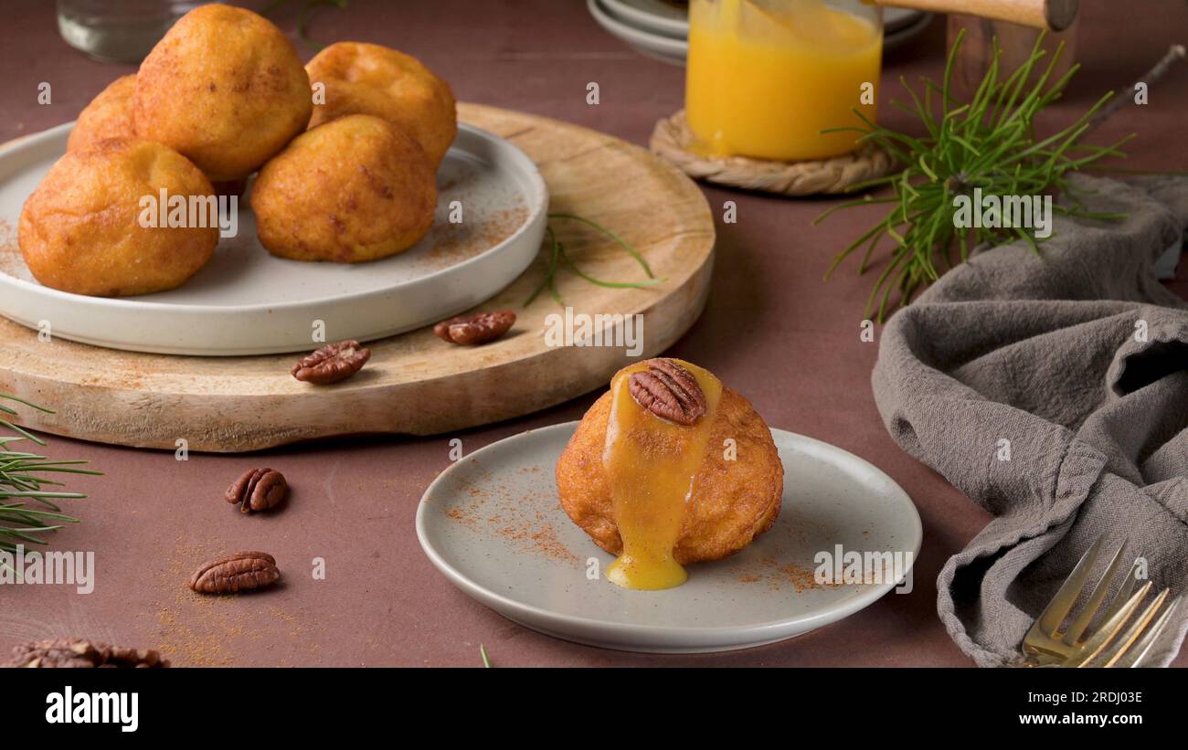 Traditional portuguese Christmas sweets Sonhos with sugar and cinnamon
