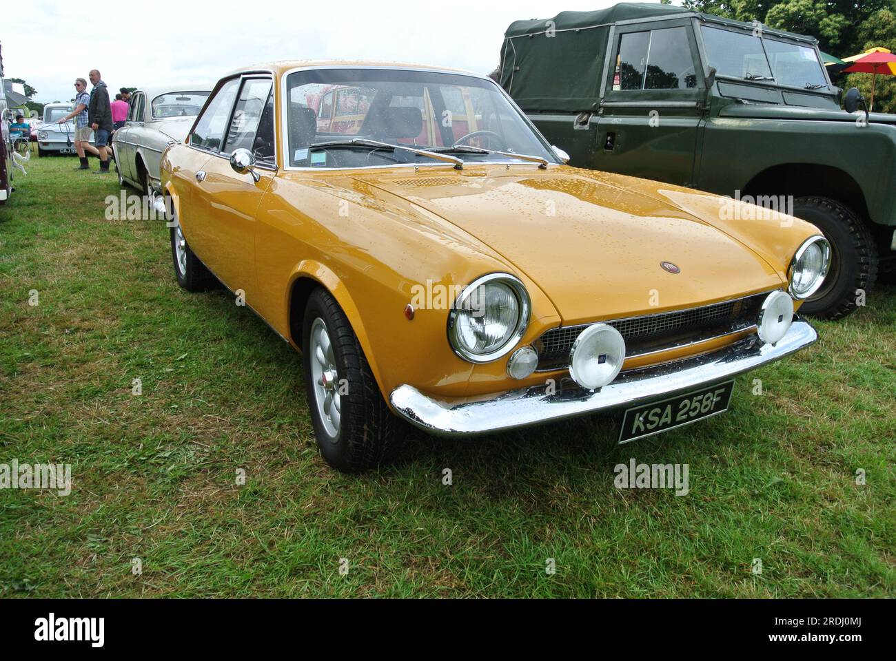 A 1968 Fiat 124 Sport Coupe parked on display at the 48th Historic Vehicle Gathering, Powderham, Devon, England, UK. Stock Photo