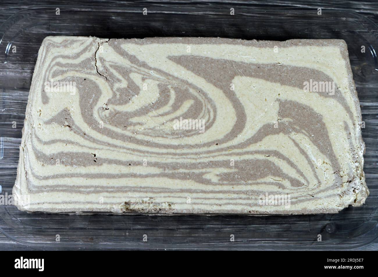 Traditional tahini halva with chocolate or Halawa Tahiniya, the primary