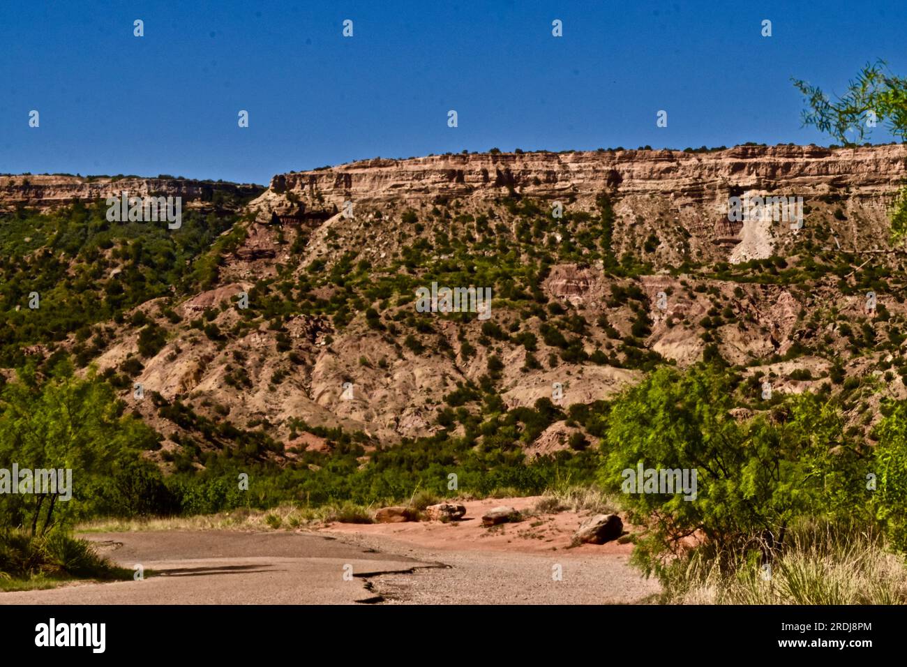 Rocky Cliff along the Rlm of Palo Duro Canyon State Park near Canyon, Texas. Stock Photo