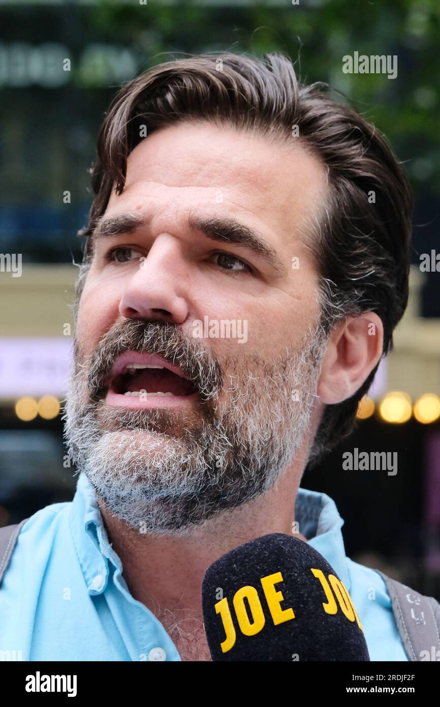 London, UK. 21st July, 2023. Actor, comedian, writer and activist Rob Delaney is interviewed by media. A rally organised by acting union Equity was attended by hundreds of members and A-list stars in solidarity with striking Sag-Aftra colleagues, who walked-out last week over pay and the use of artificial intelligence in the industry. Credit: Eleventh Hour Photography/Alamy Live News Stock Photo