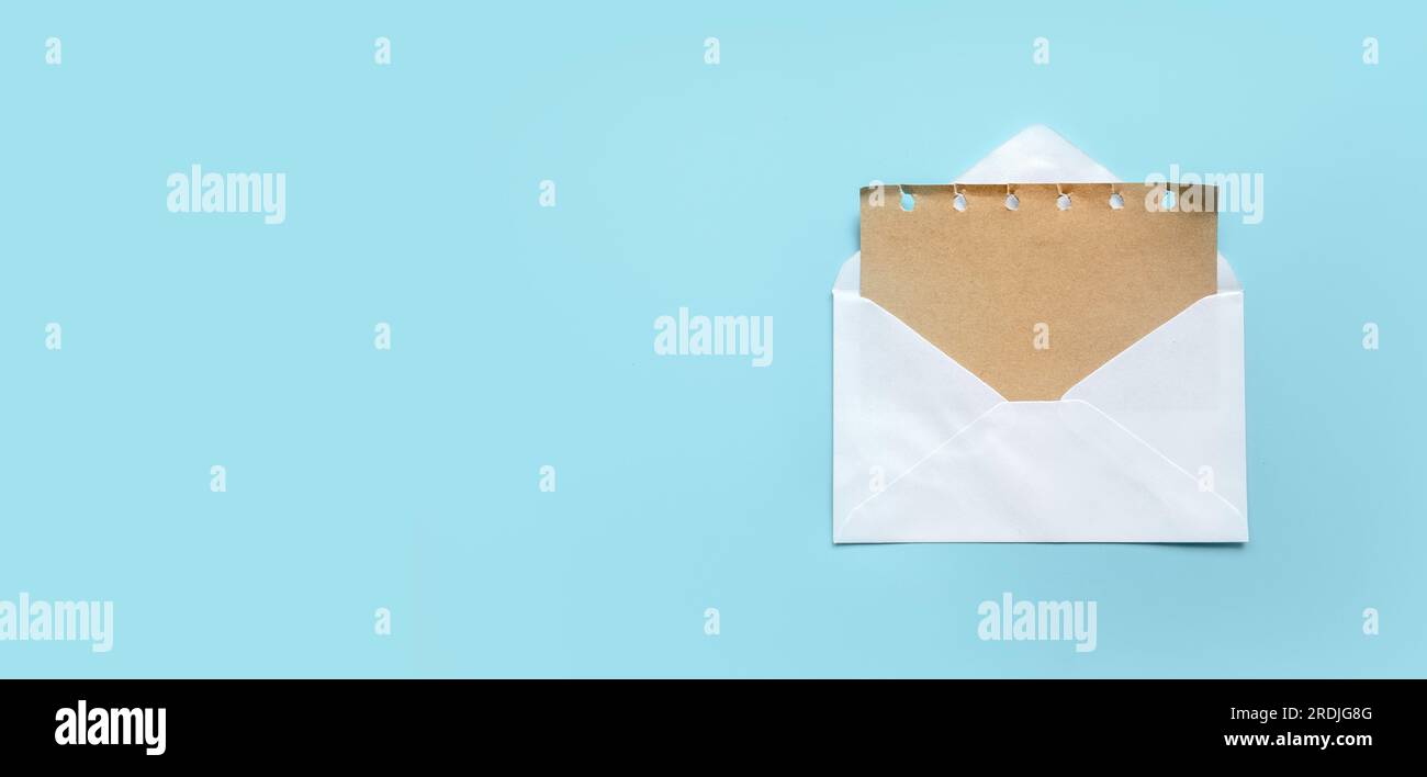 Greeting card or invitation mailing concept.Brown paper from an open