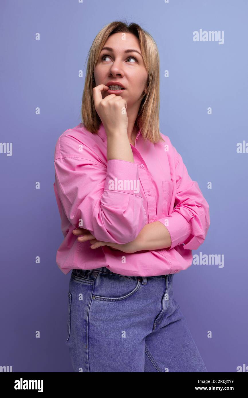 Young Pensive Blond Caucasian Secretary Woman With Flowing Hair Is young-pensive-blond-caucasian-secretary-woman-with-flowing-hair-is