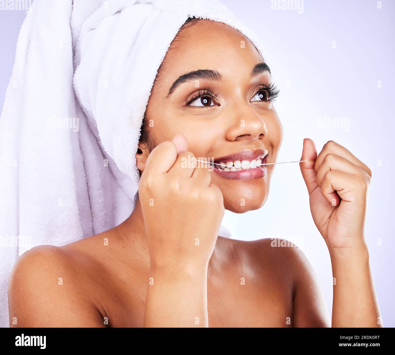Tooth, oral care and woman with dental floss in studio for fresh breath