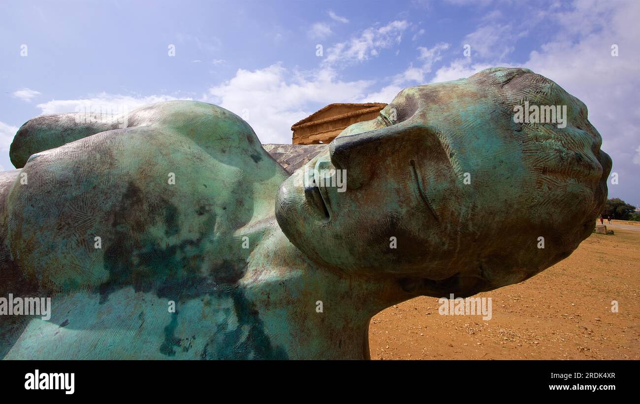 Bronze statue of fallen Icarus, deatil, head, Concordia temple, valley of the temples, valle dei templi, Agrigento, Sicily, Italy Stock Photo