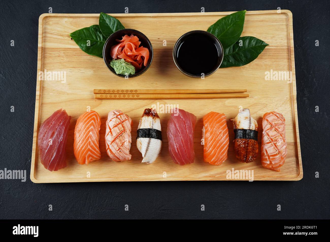 japanese-traditional-cuisine-set-of-nigiri-sushi-topped-with-sake