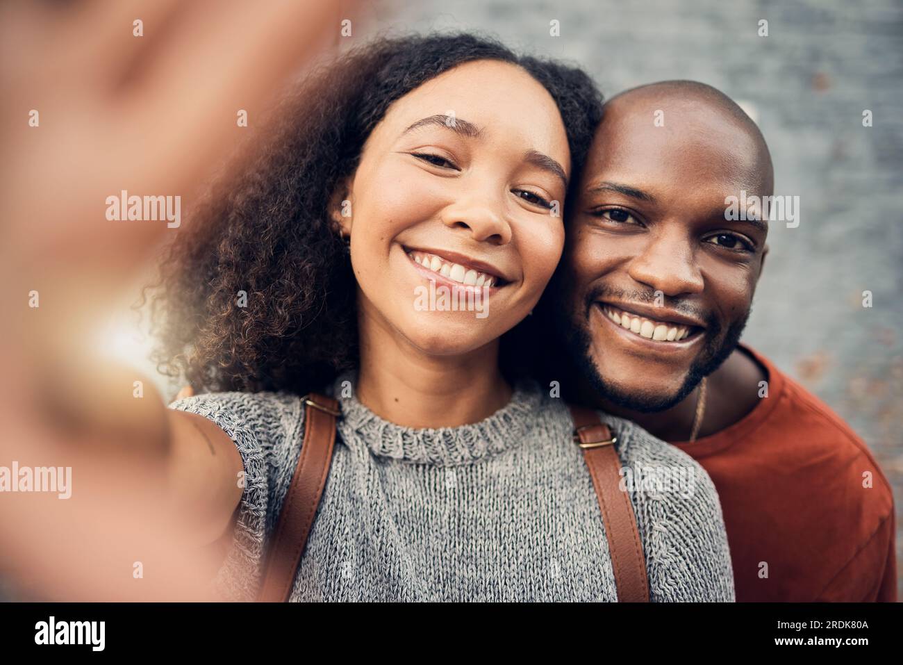 Face, interracial couple and selfie outdoor, happy and bonding together