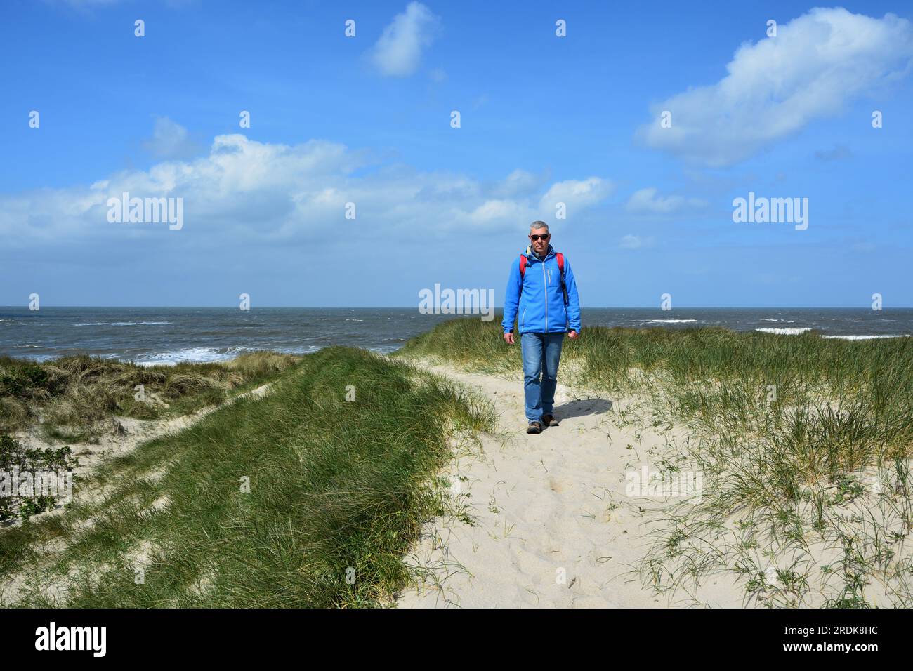 Walking from the North Sea to the Wadden Sea near Hörnum, Sylt, Frisian Islands, Germany Stock Photo