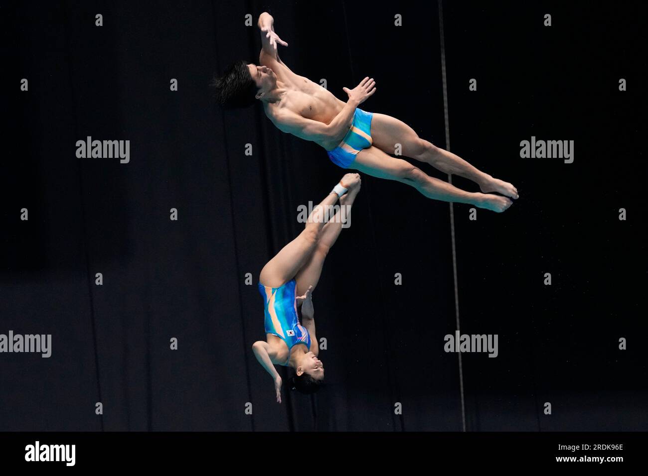 Yi Jaegyeong and Kim Suji of South Korea compete in the mixed diving