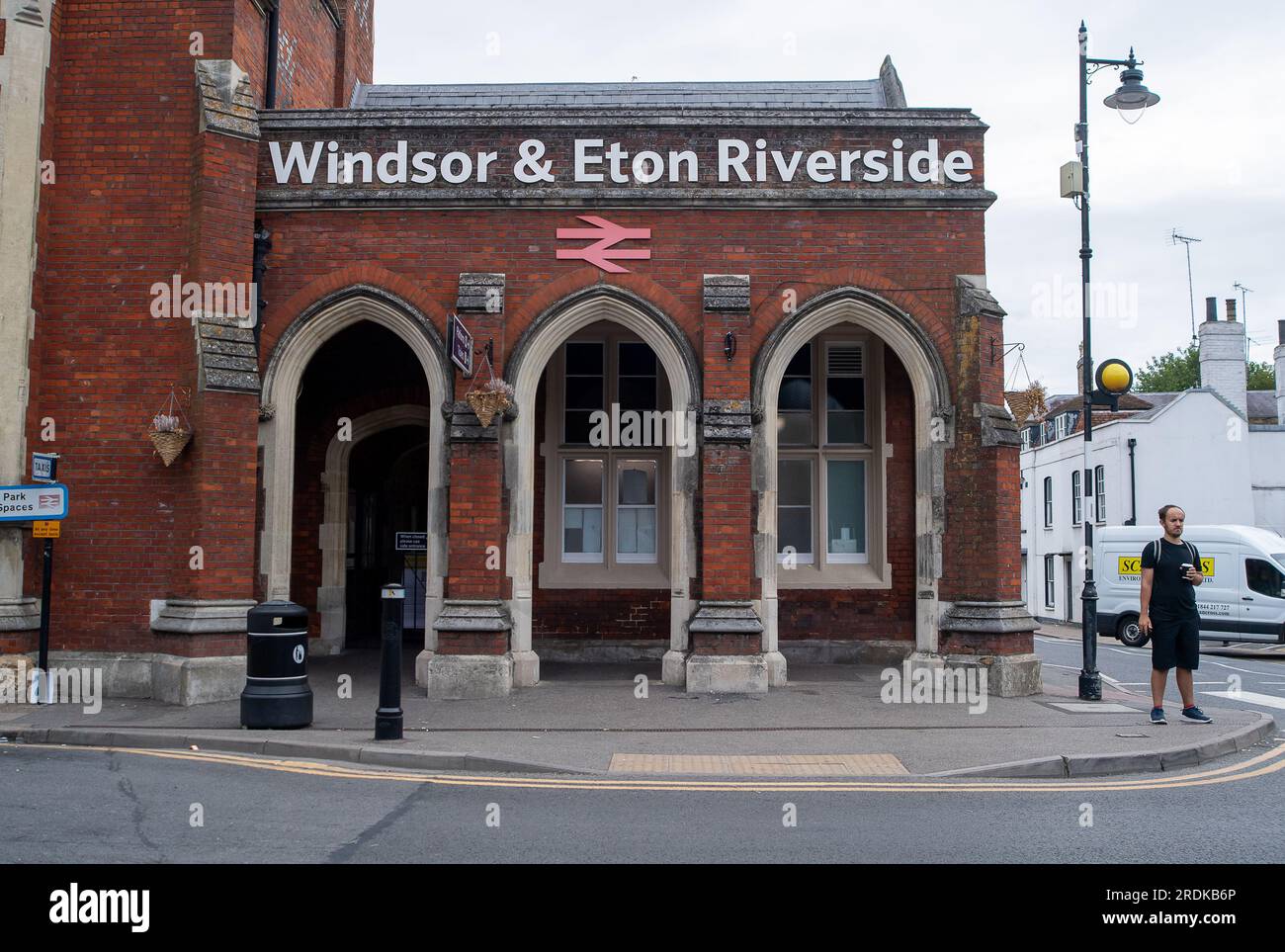 Windsor, Berkshire, UK. 22nd July, 2023. A passenger tries to make alternative arrangements as the Windsor & Eton Riverside Station is closed today due to Industrial Action by rail workers. RMT Strikes are taking place across parts of the rail network in England today in an ongoing dispute about pay and the closure of railyway station ticket offices. The Rail Industry Body, The Rail Delivery Group have announced that plans to close the majority of all railway station ticket offices in England have been confirmed.  This is a huge blow to rail workers, many of whom, fear they will lose their job Stock Photo