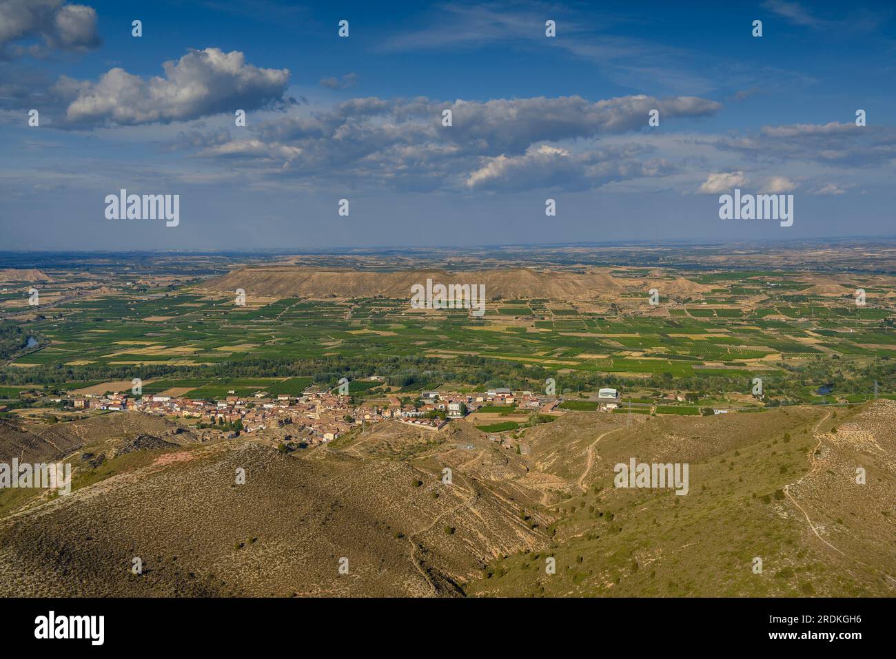 The town of Torrente de Cinca and its agricultural surroundings seen from the viewpoint of the hermitage monastery of San Salvador (Aragon, Spain) Stock Photo
