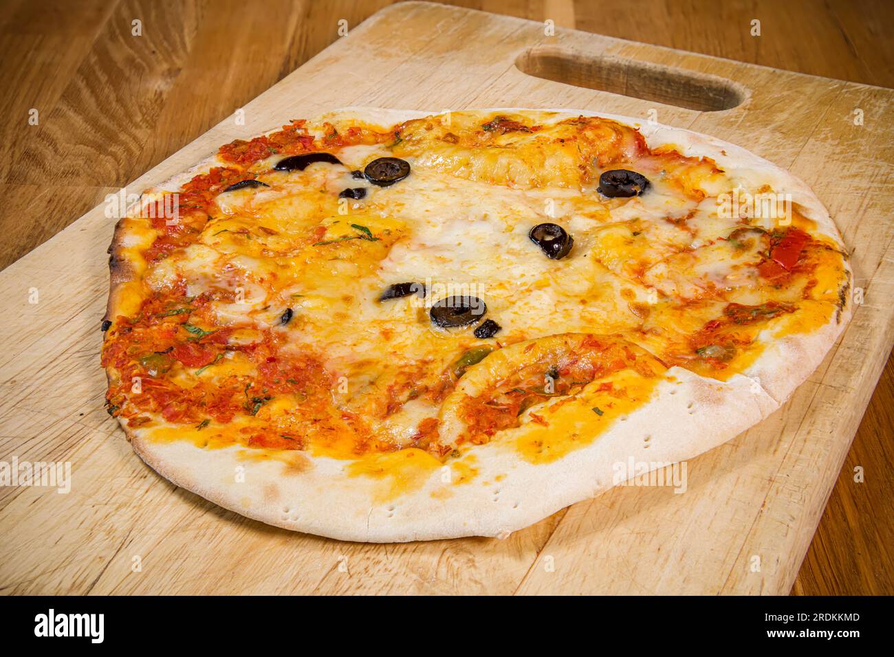 Plain tasty tomatoes and cheese manakish, arabic cuisine and food Stock