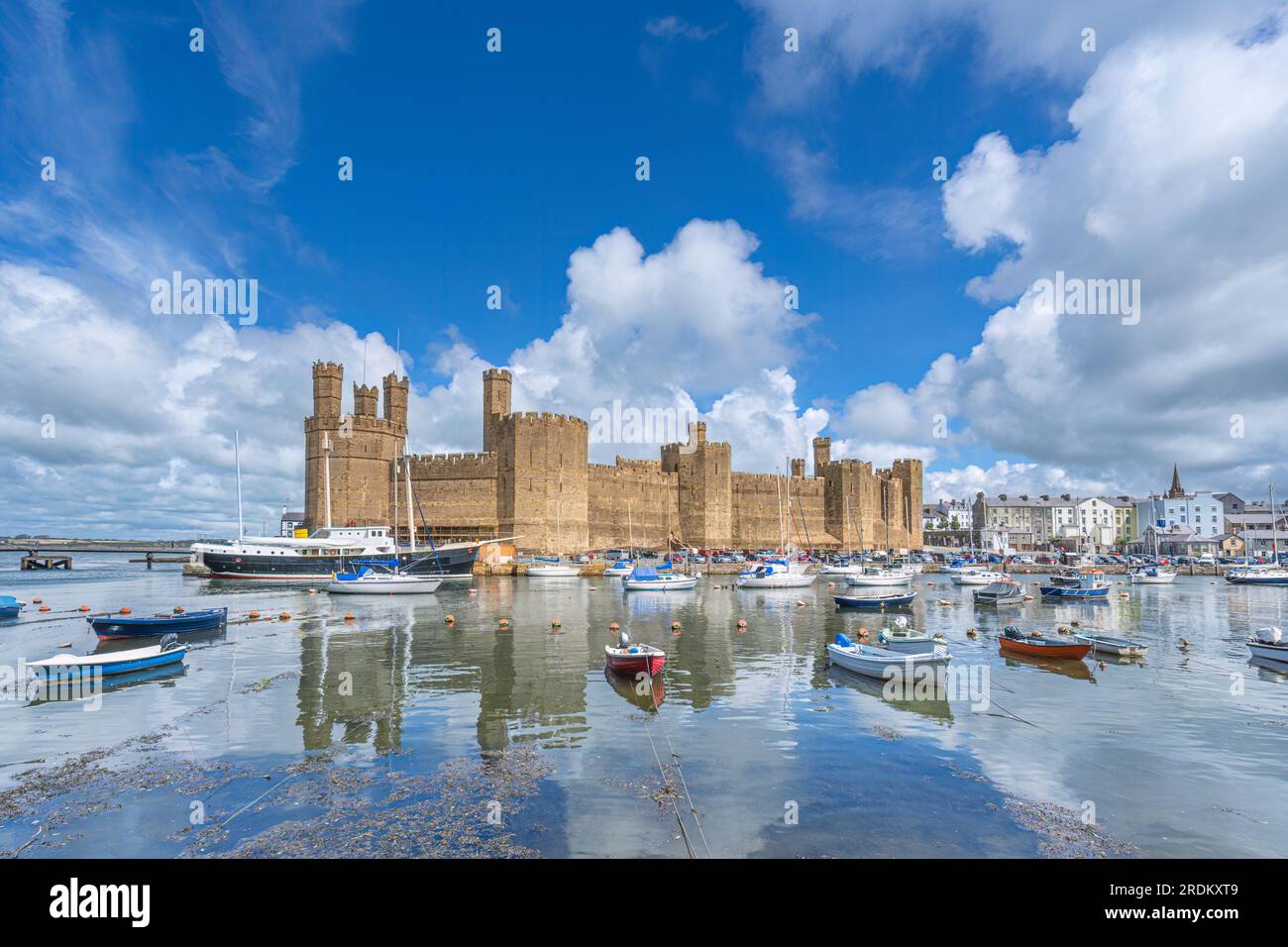 Caernarfon Castle on the Seiont River and the Menai Strait in North Wales Stock Photo